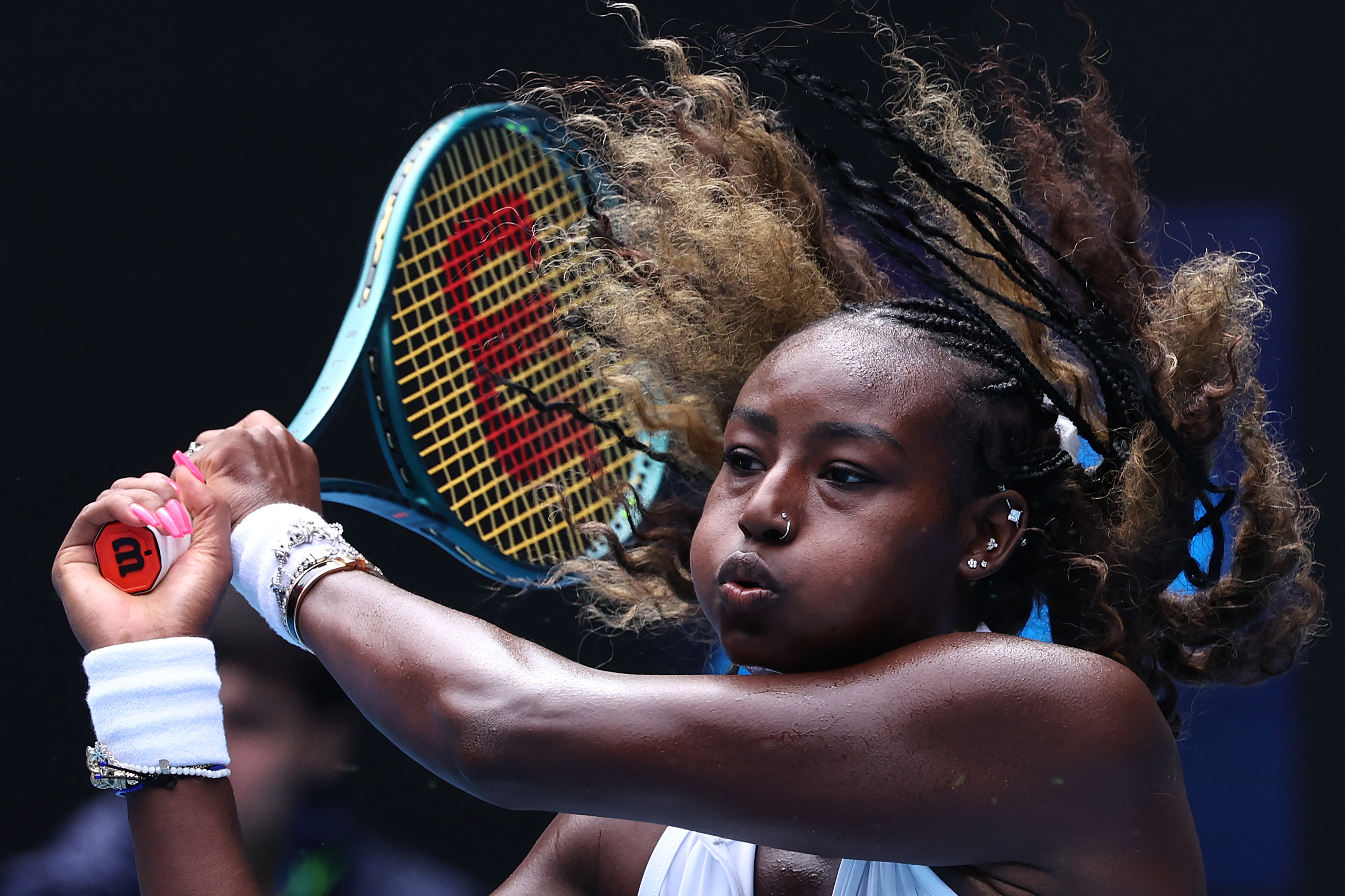 USA's Alycia Parks hits a return against her compatriot Coco Gauff during their women's singles match on day six of the Australian Open tennis tournament in Melbourne on January 19
