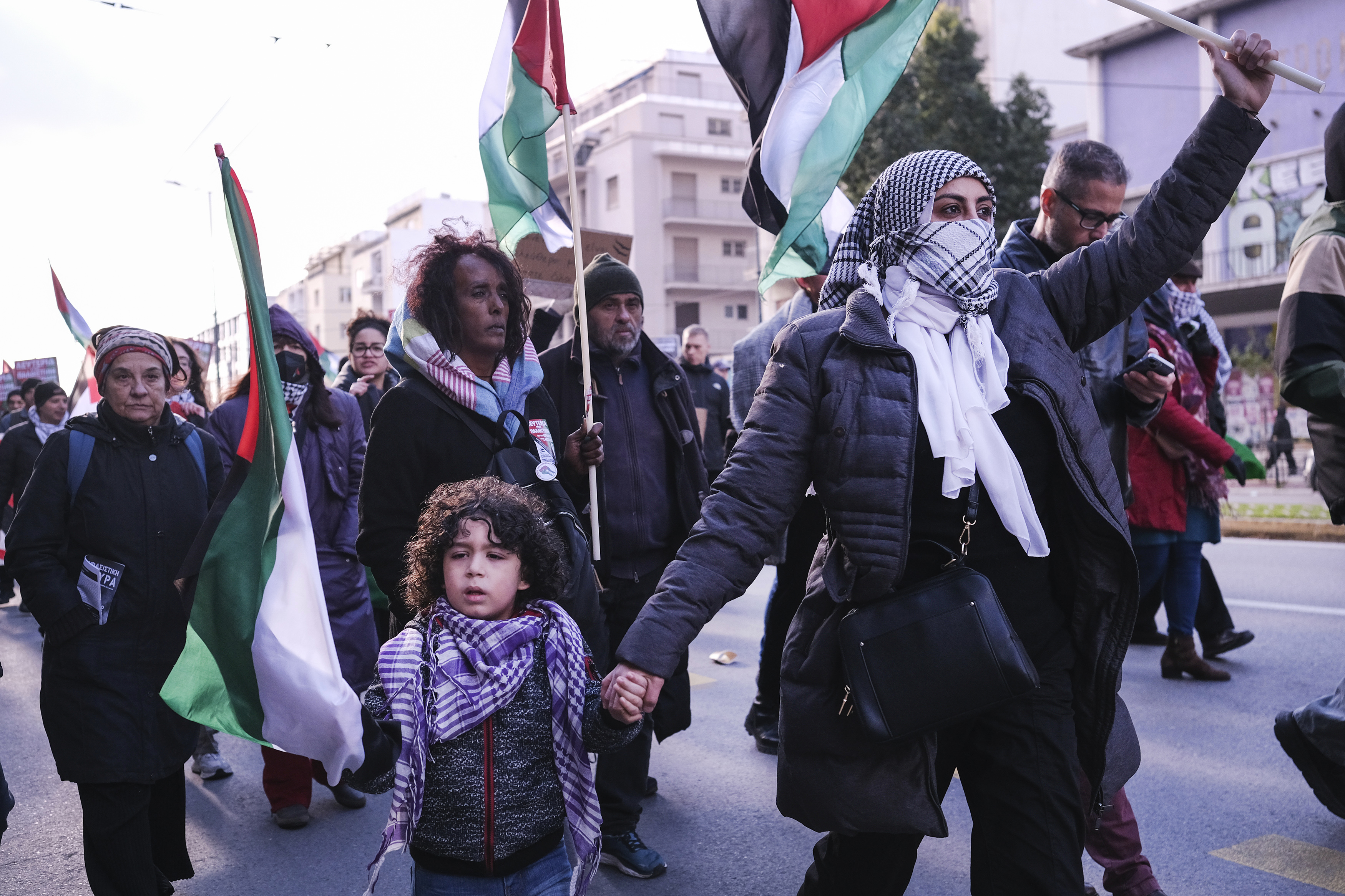 Protesters take part in a rally in support of Palestinians, in Athens, Greece, Saturday