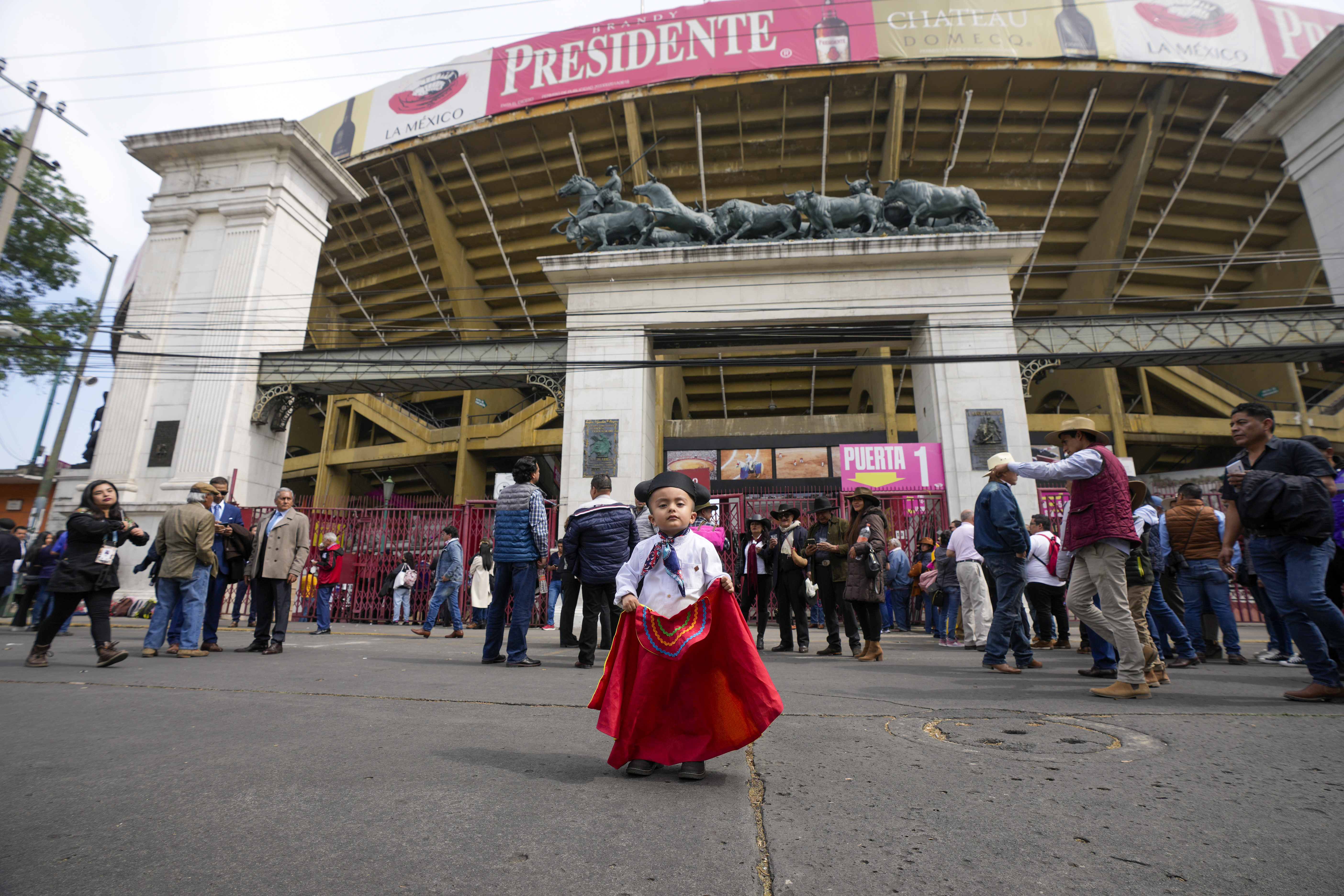 People arrive to the Plaza Mexico for a bullfighting