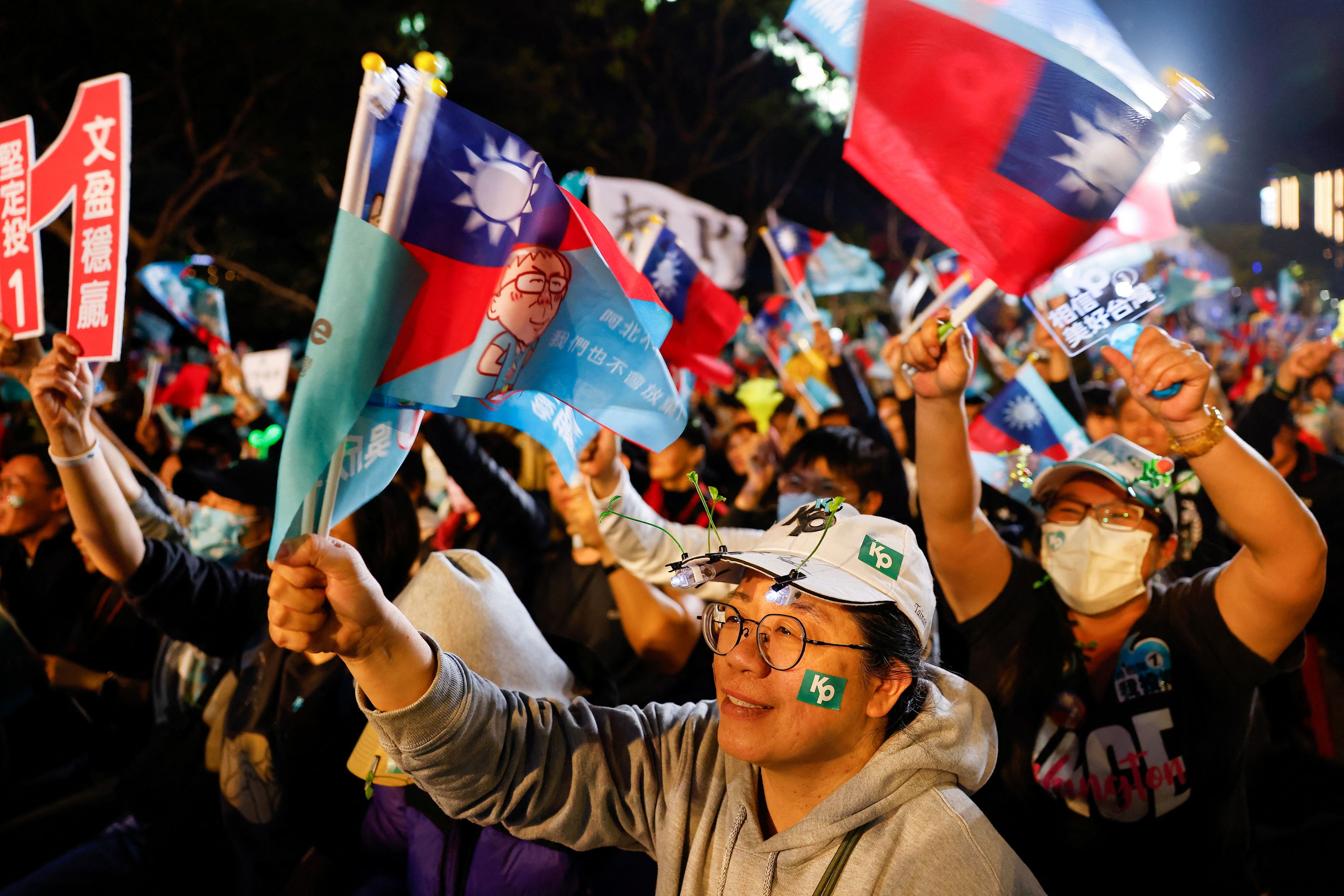 Supporters of Ko Wen-je, Taiwan People's Party (TPP) presidential candidate, attend a campaign event ahead of the election in Kaohsiung
