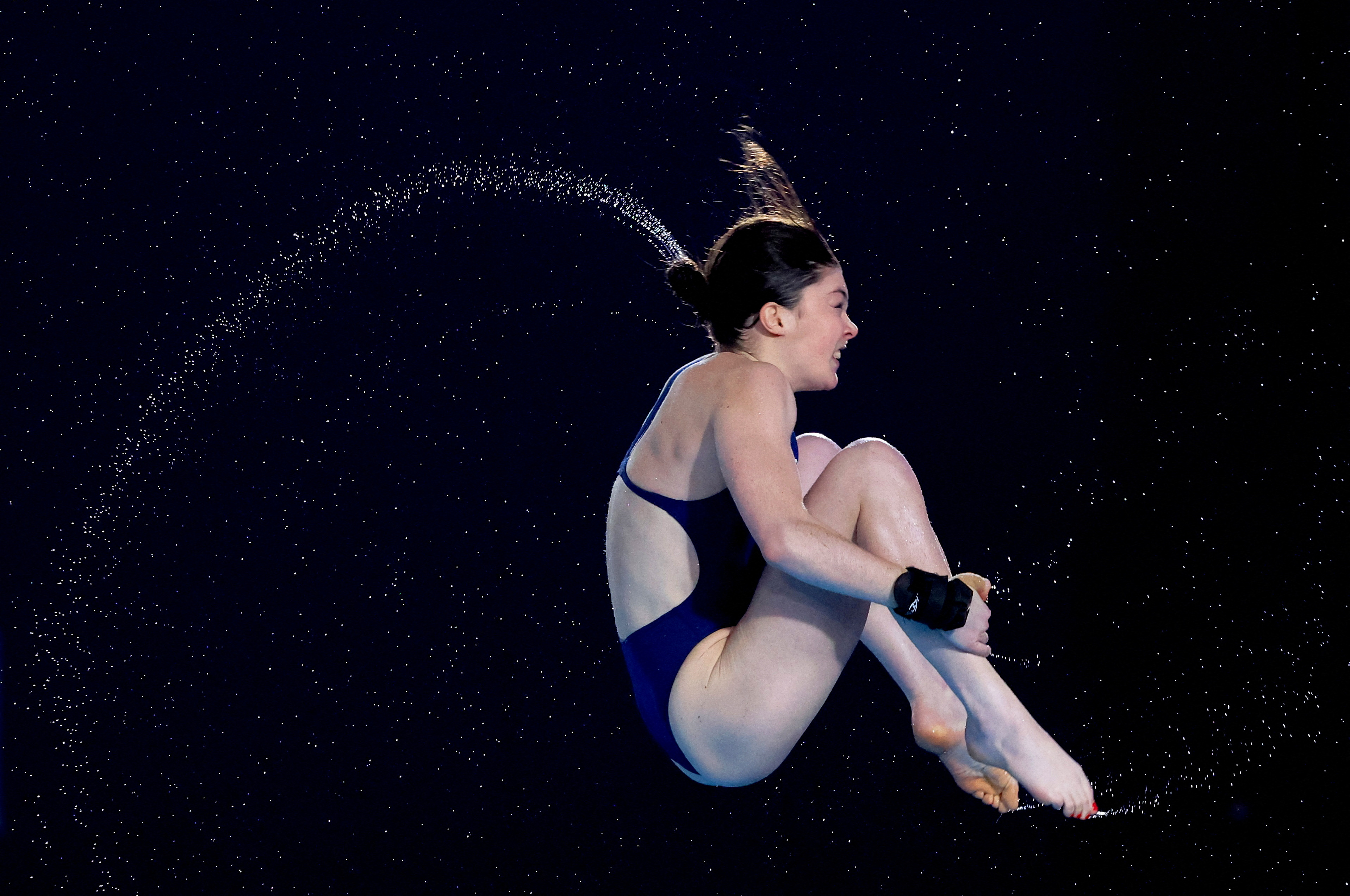 Diving - World Aquatics Championships - Hamad Aquatic Centre, Doha, Qatar - February 4, 2024 Britain's Andrea Spendolini Sirieix in action during the women's 10m platform preliminary round