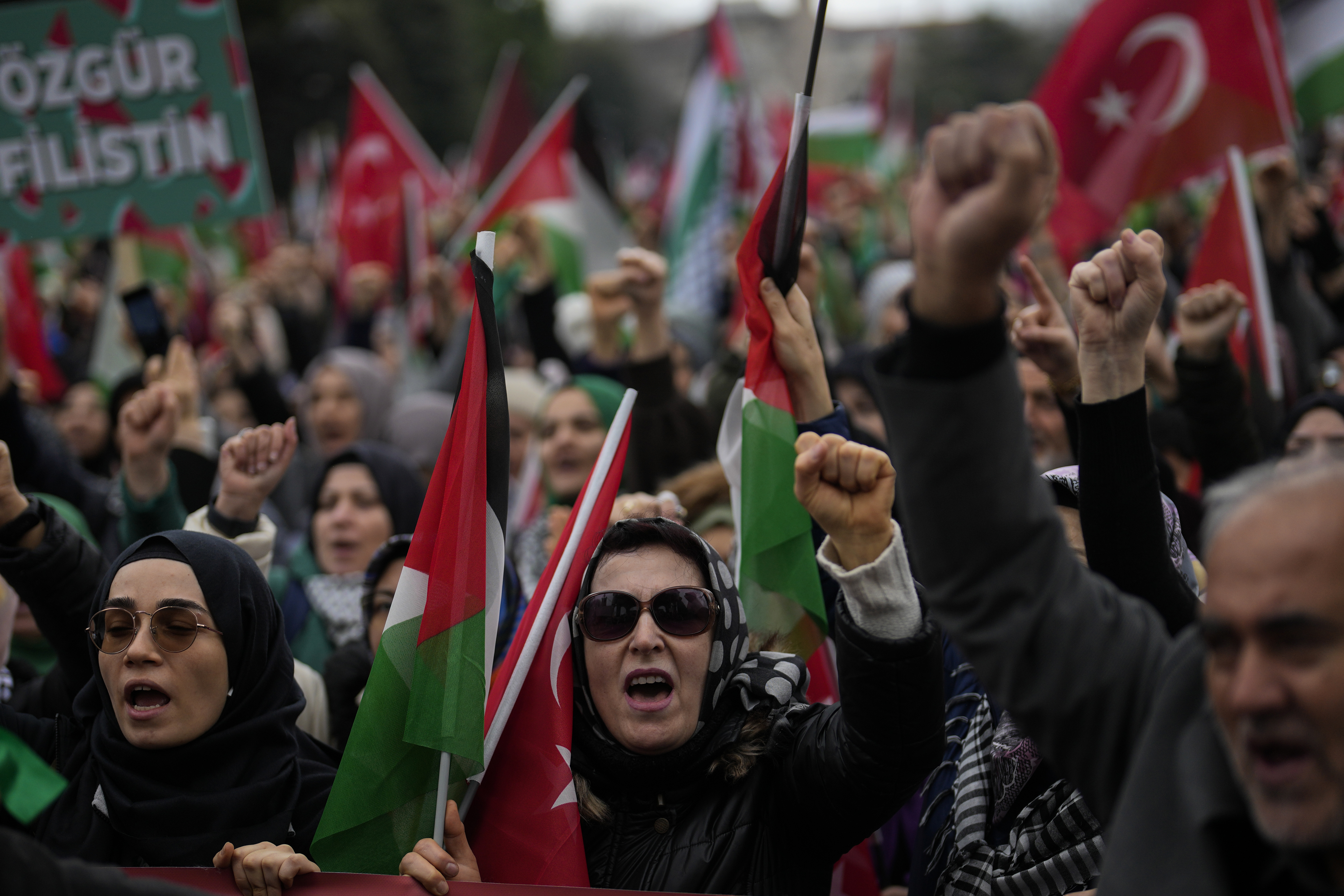 People protest in support of Palestinians in Gaza during a protest rally in Istanbul, Turkey, Saturday, Feb. 17