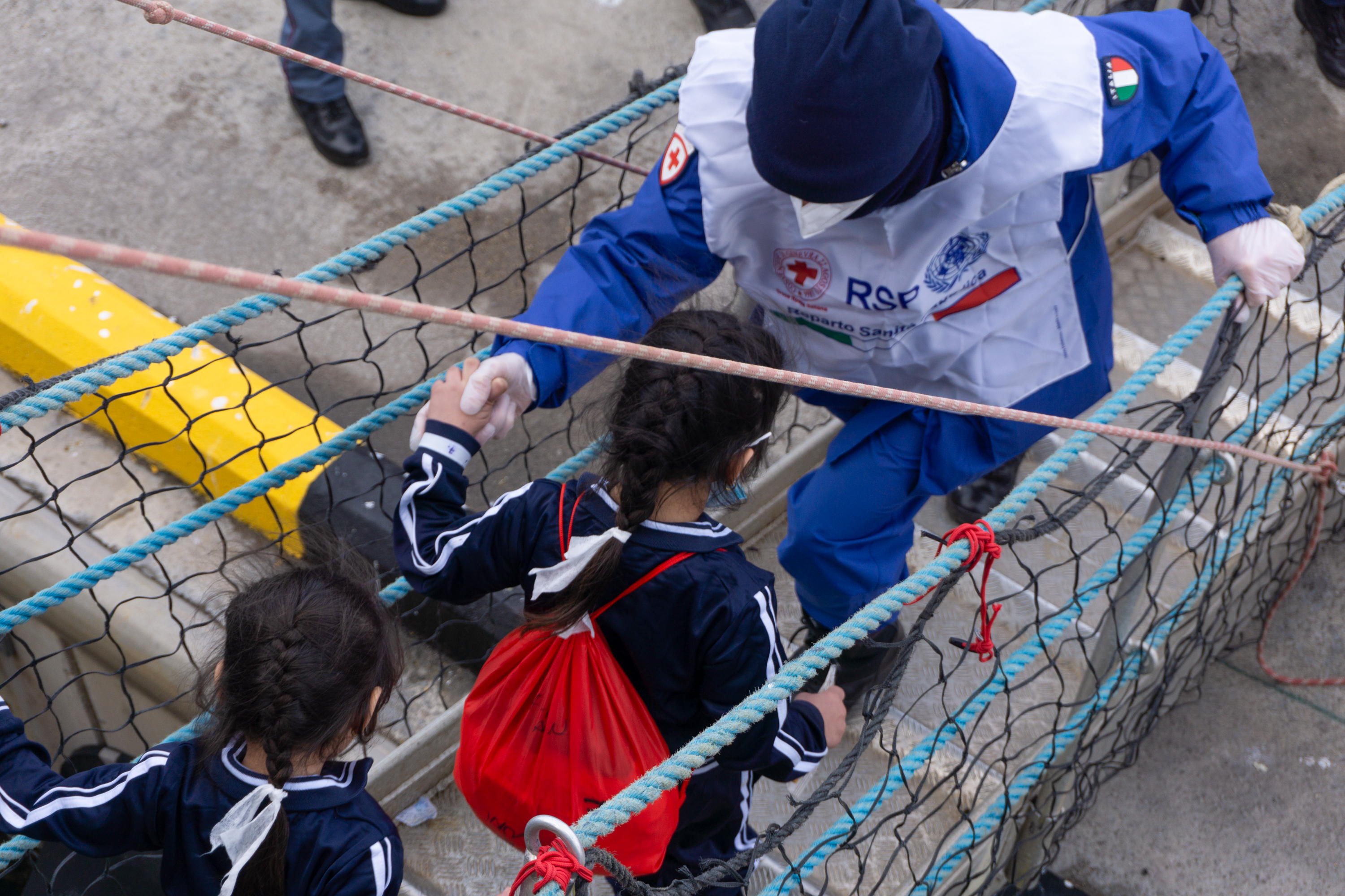 Other children leaving the vessel. [Nora Adin Fares/Al Jazeera]