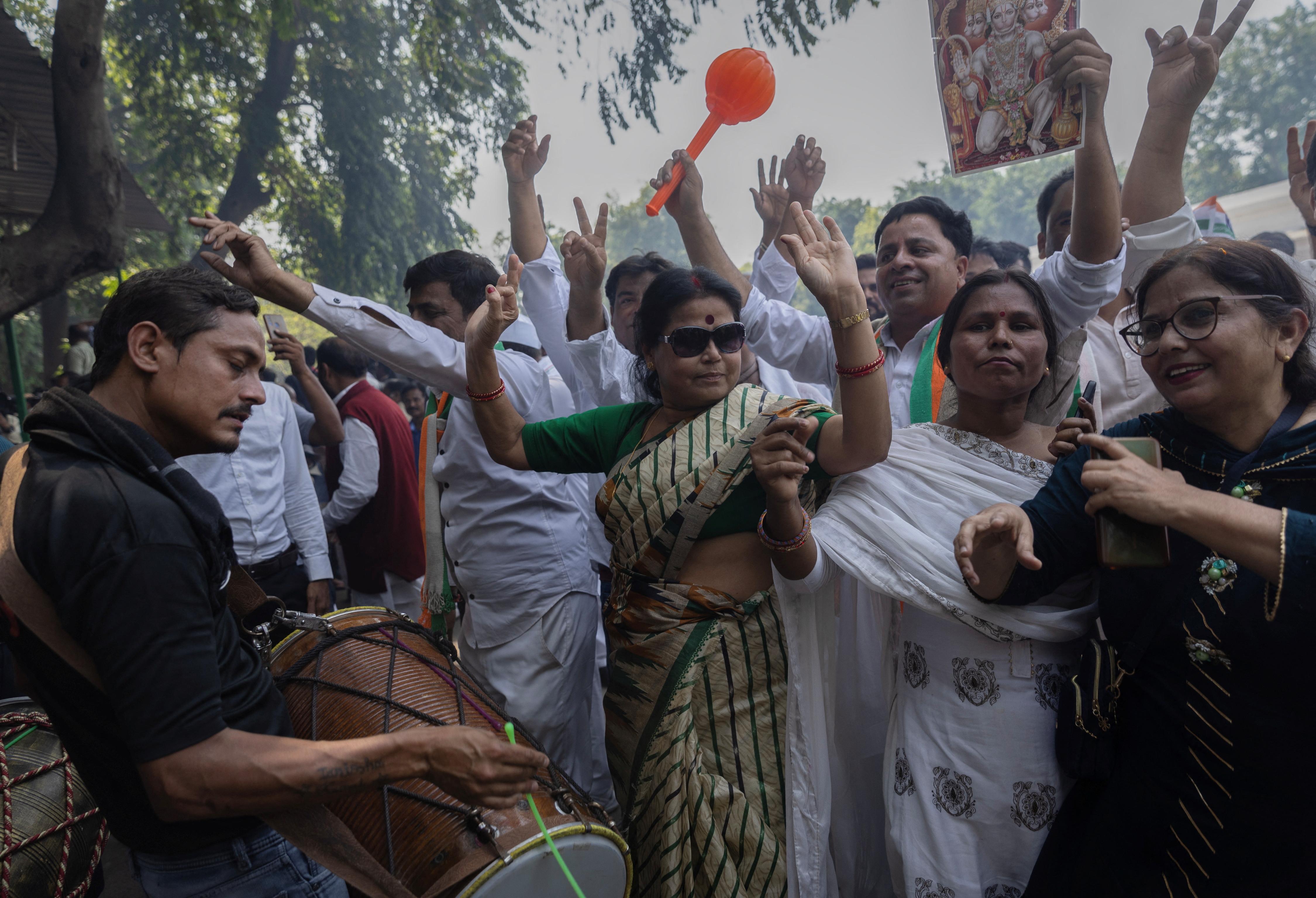 Supporters of India's main opposition Congress party celebrate after the initial poll results in Karnataka elections at the party headquarters, in New Delhi, India, May 13, 2023. REUTERS/Adnan Abidi