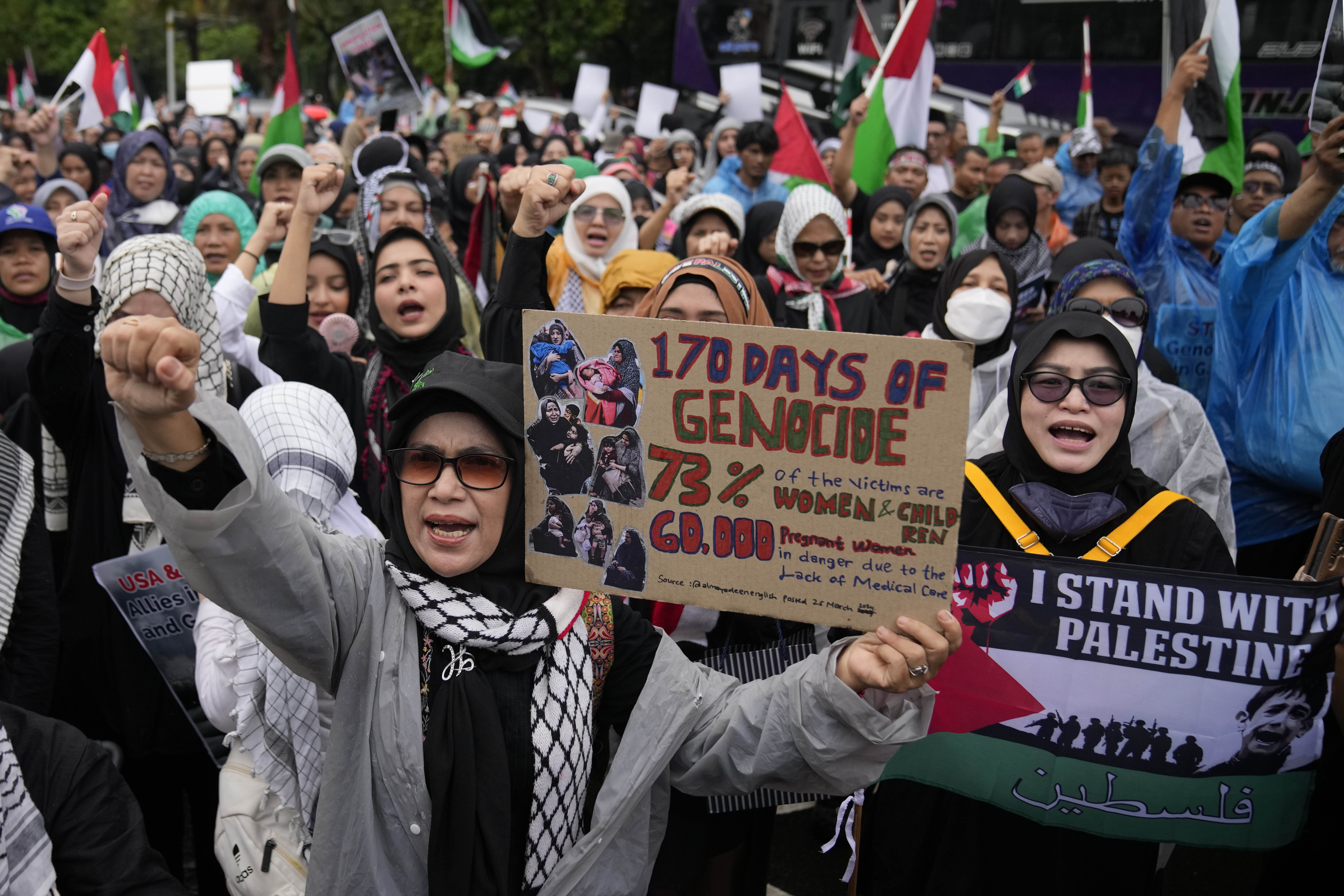 Muslim protesters shout slogans during an Al-Quds (Jerusalem) Day rally outside the U.S. Embassy in Jakarta, Indonesia