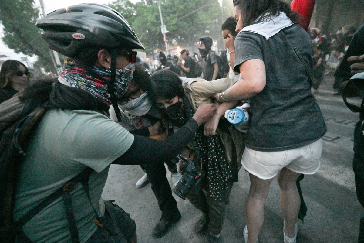Demonstrators clash with the police during a pro-Palestinian rally called "Urgent action for Rafah"