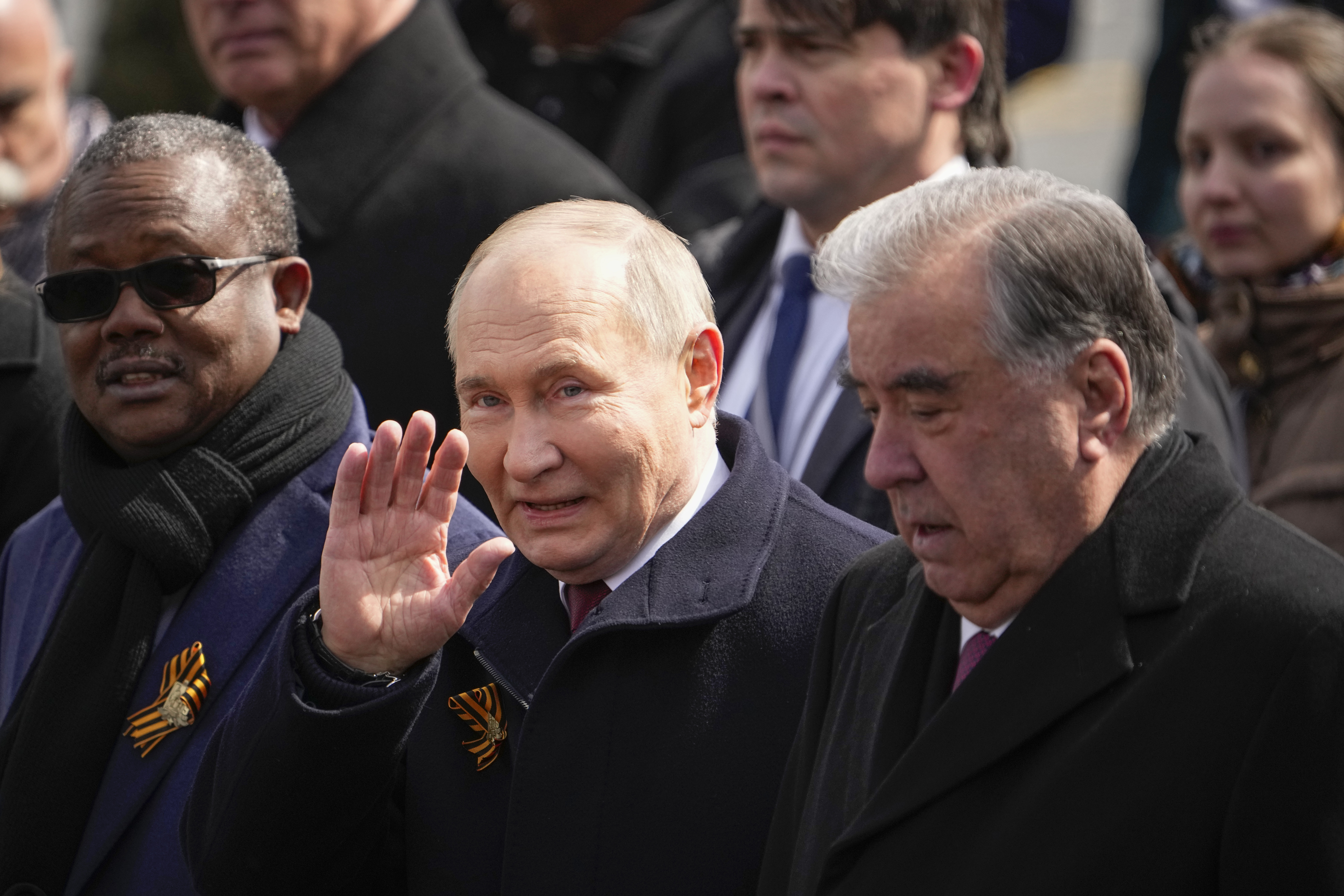 President of the Republic of Tajikistan Emomali Rahmon, right, and Russian President Vladimir Putin, front center,