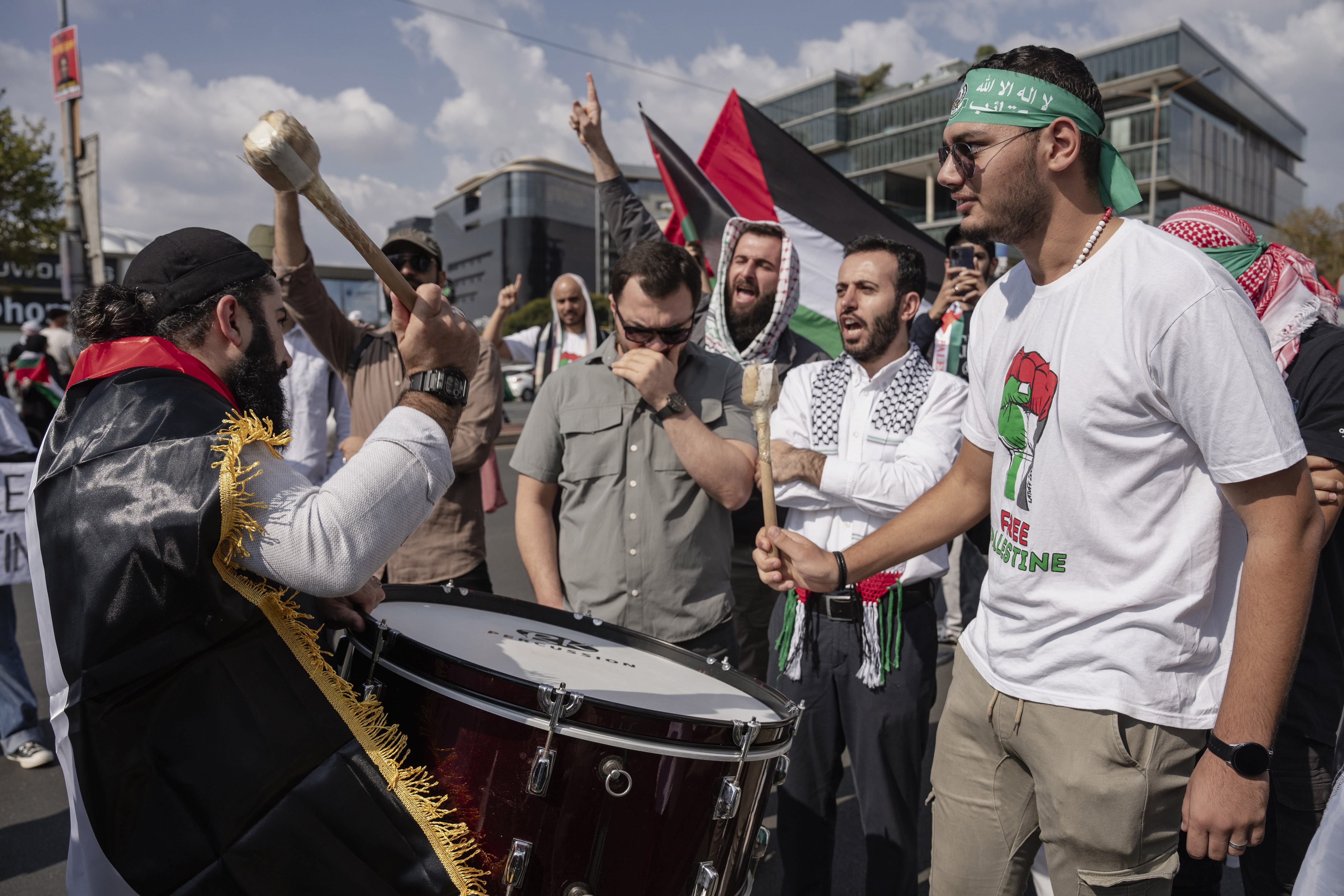 Hundreds of people, holding banners and Palestinian flags, gather in front of the Consulate General of United States to protest against Israeli attacks on Gaza and to show their support for Palestinian people in Johannesburg, South Africa on March 30, 2024