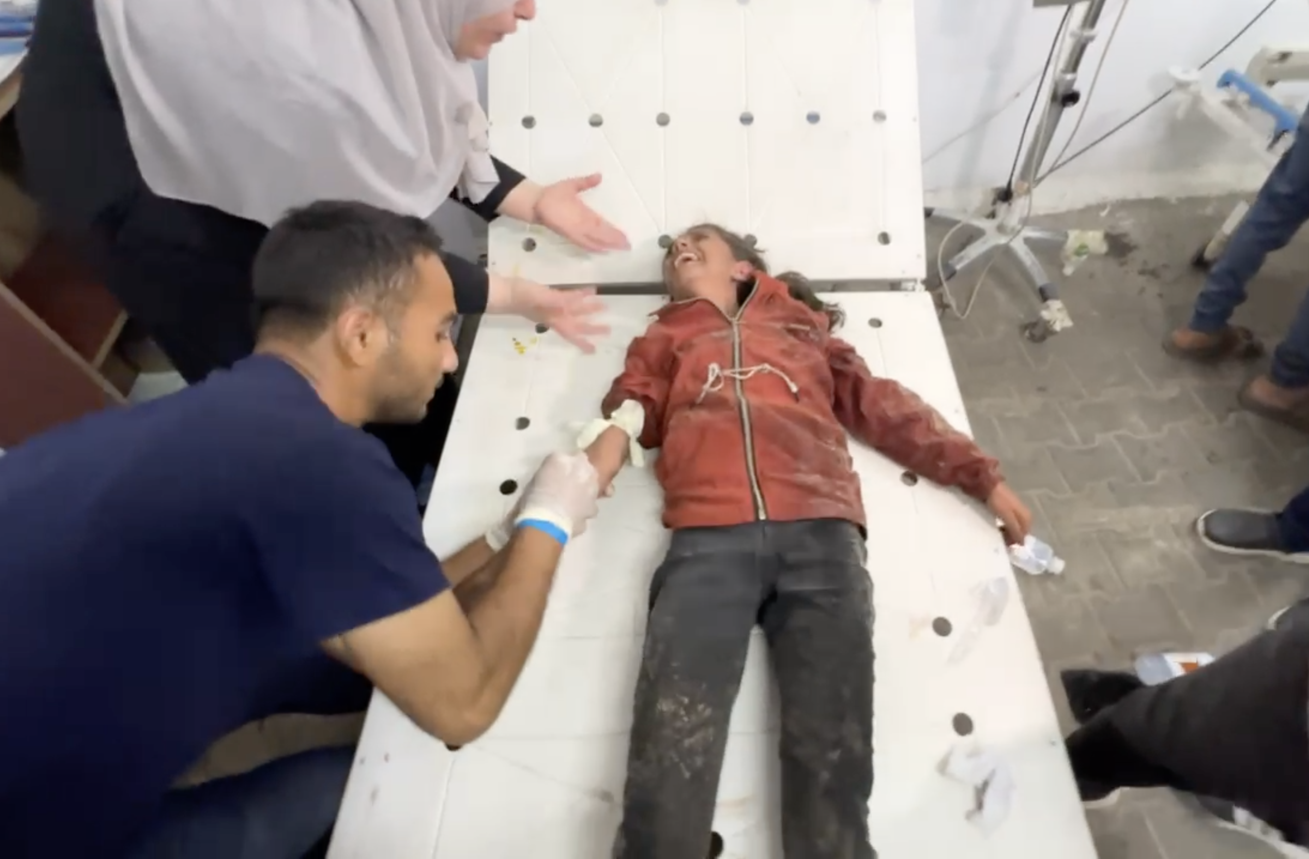A young girl being treated at Kuwait Hospital following an Israeli attack on Rafah