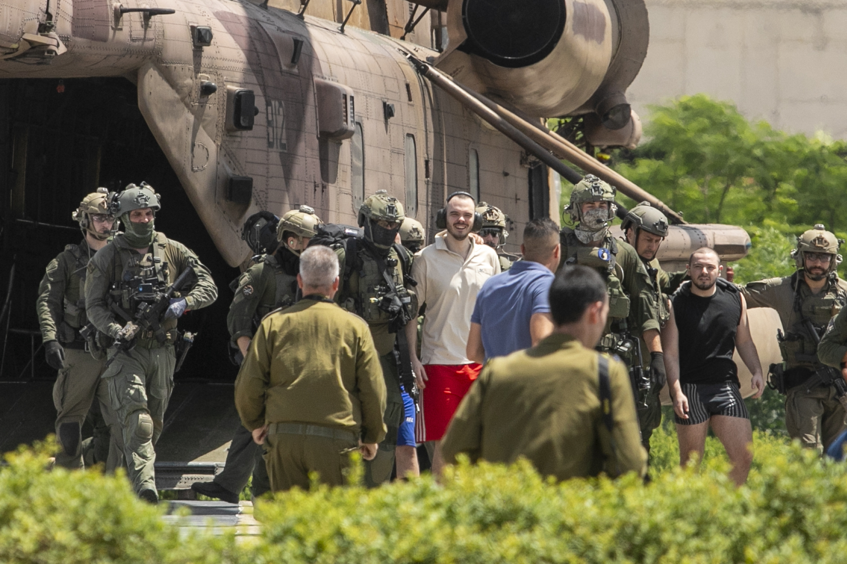 Andrey Kozlov, 27, left, and Almog Meir Jan, 21, two of four hostages who were kidnapped in a Hamas-led attack on Oct. 7, 2023, and were just rescued, arrive by helicopter to the Sheba Medical Center in Ramat Gan, Israel, Saturday, June 8