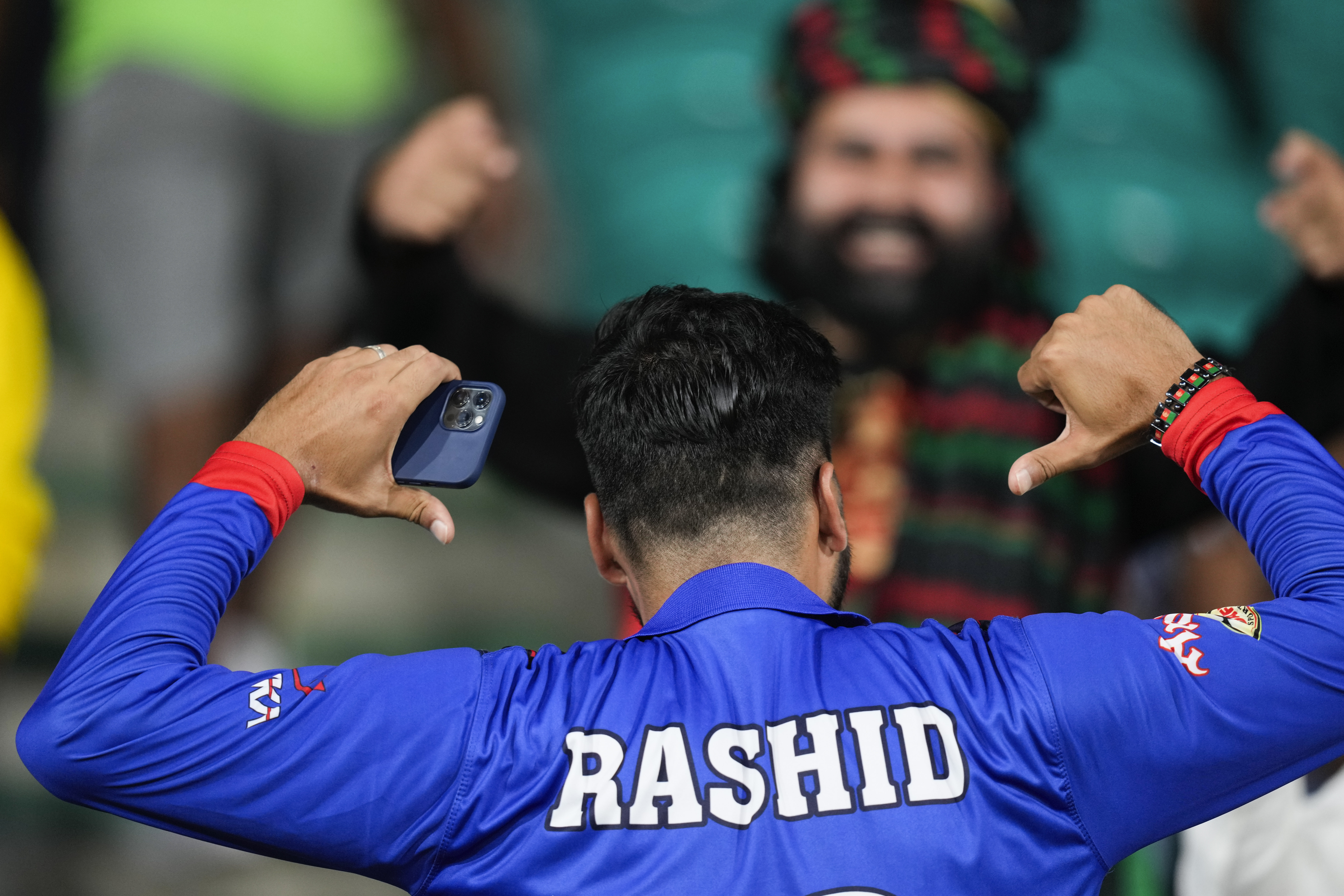Rashid Khan has become the first captain to lead Afghanistan into the semifinals of an ICC Cricket World Cup [File: Ramon Espinosa/AP]
