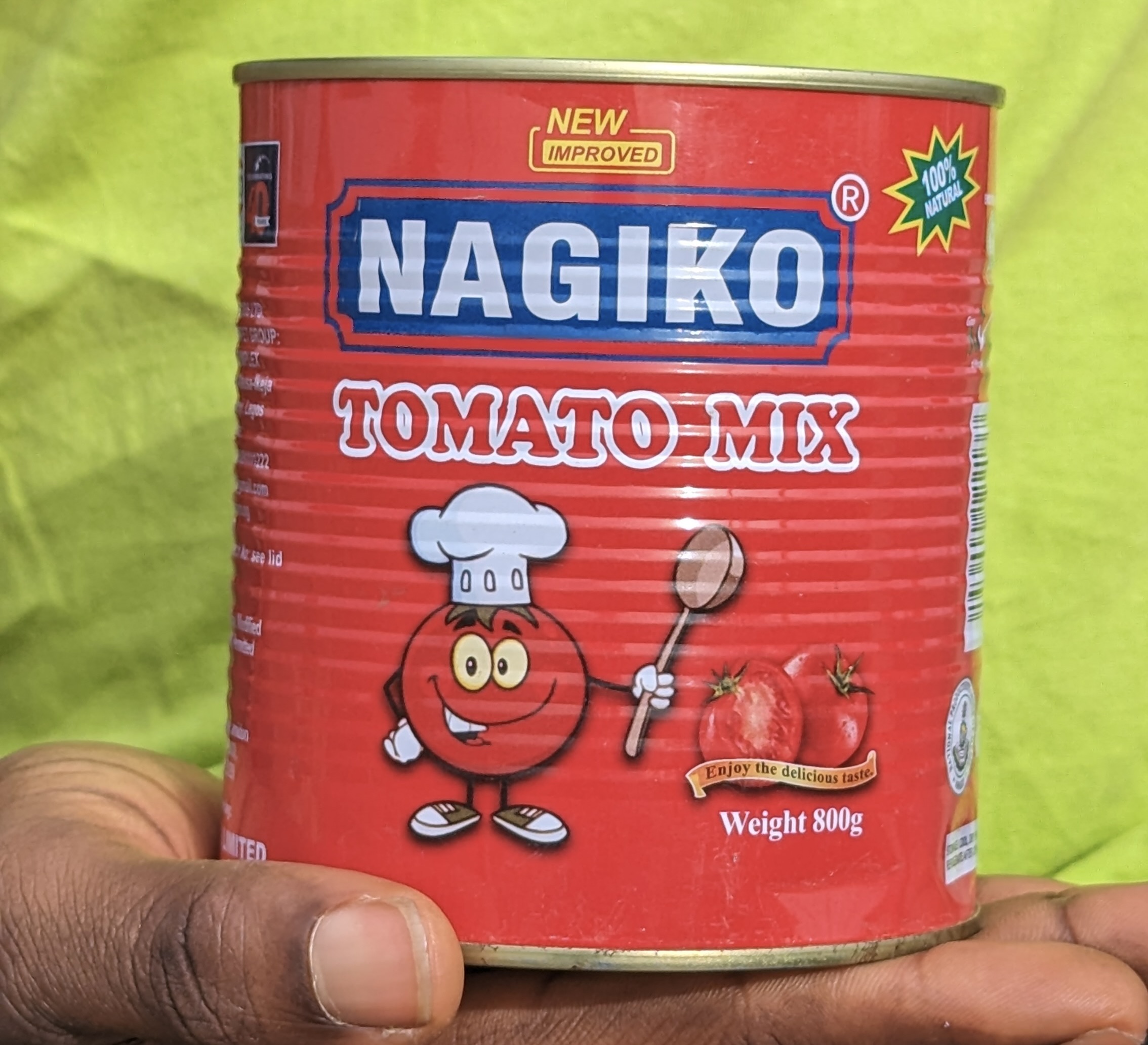 A can of Nagiko tomato puree, a seemingly innocuous product whose online review landed the Chioma Okoli, a small business owner, in legal trouble [Pelumi Salako/Al Jazeera]