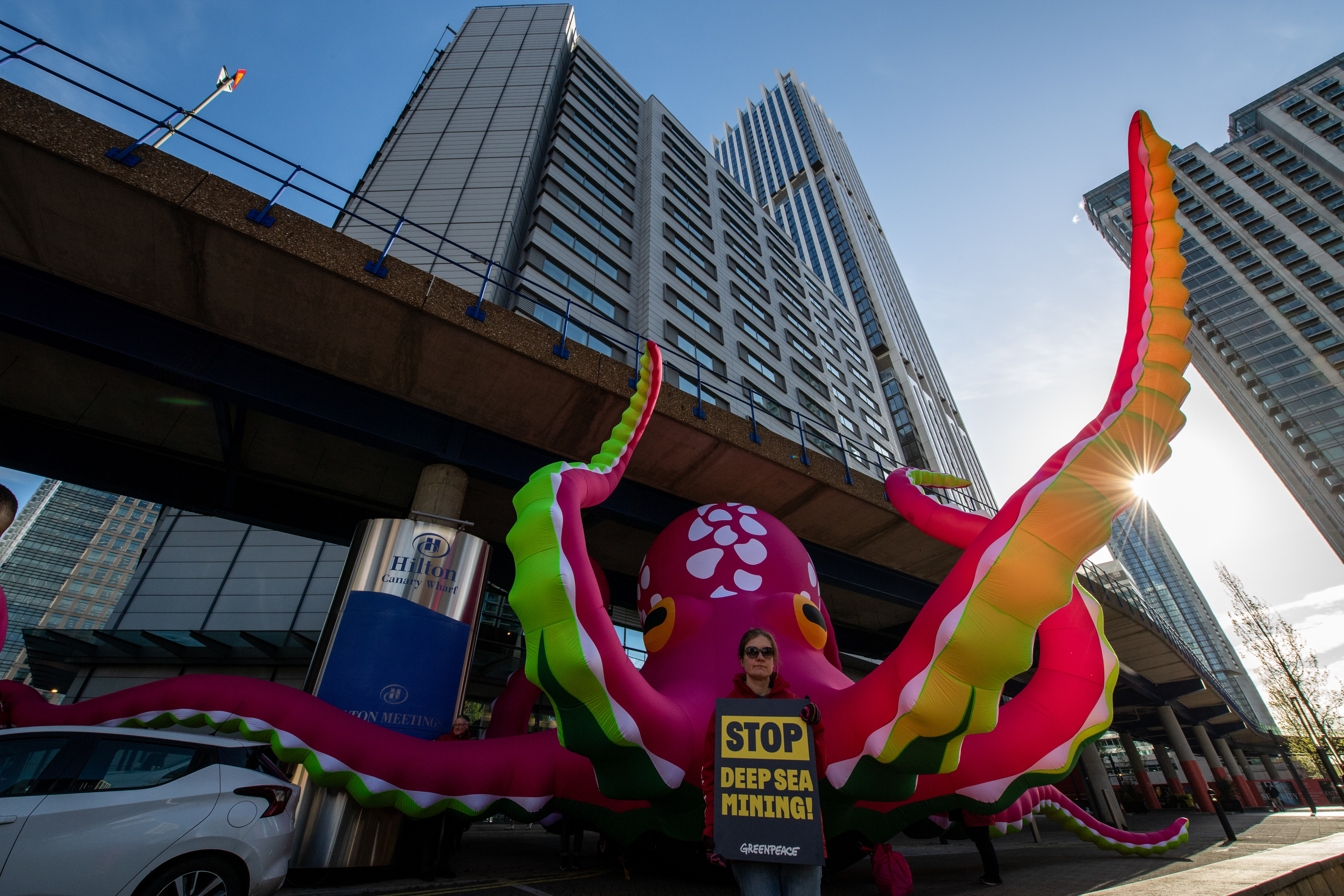 Activists protest on the opening morning of the annual Deep Sea Mining Summit on April 17, 2024 in London, England [Chris J Ratcliffe for Greenpeace via Getty Images]