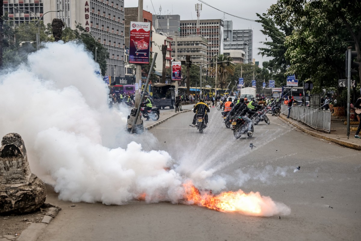 A tear gas canister explodes during renewed demonstrations in Nairobi