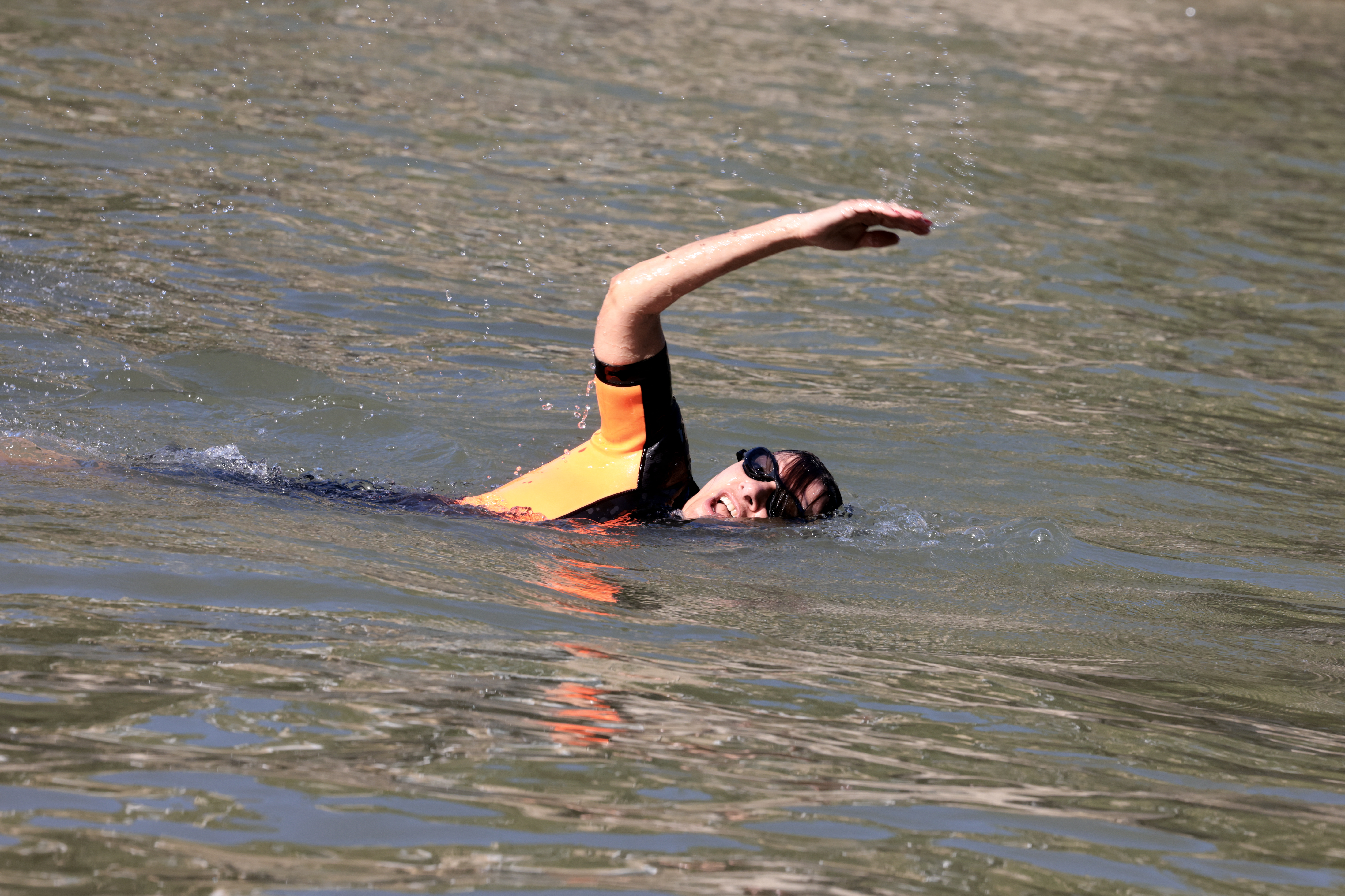 France mayor swims in River Seine.