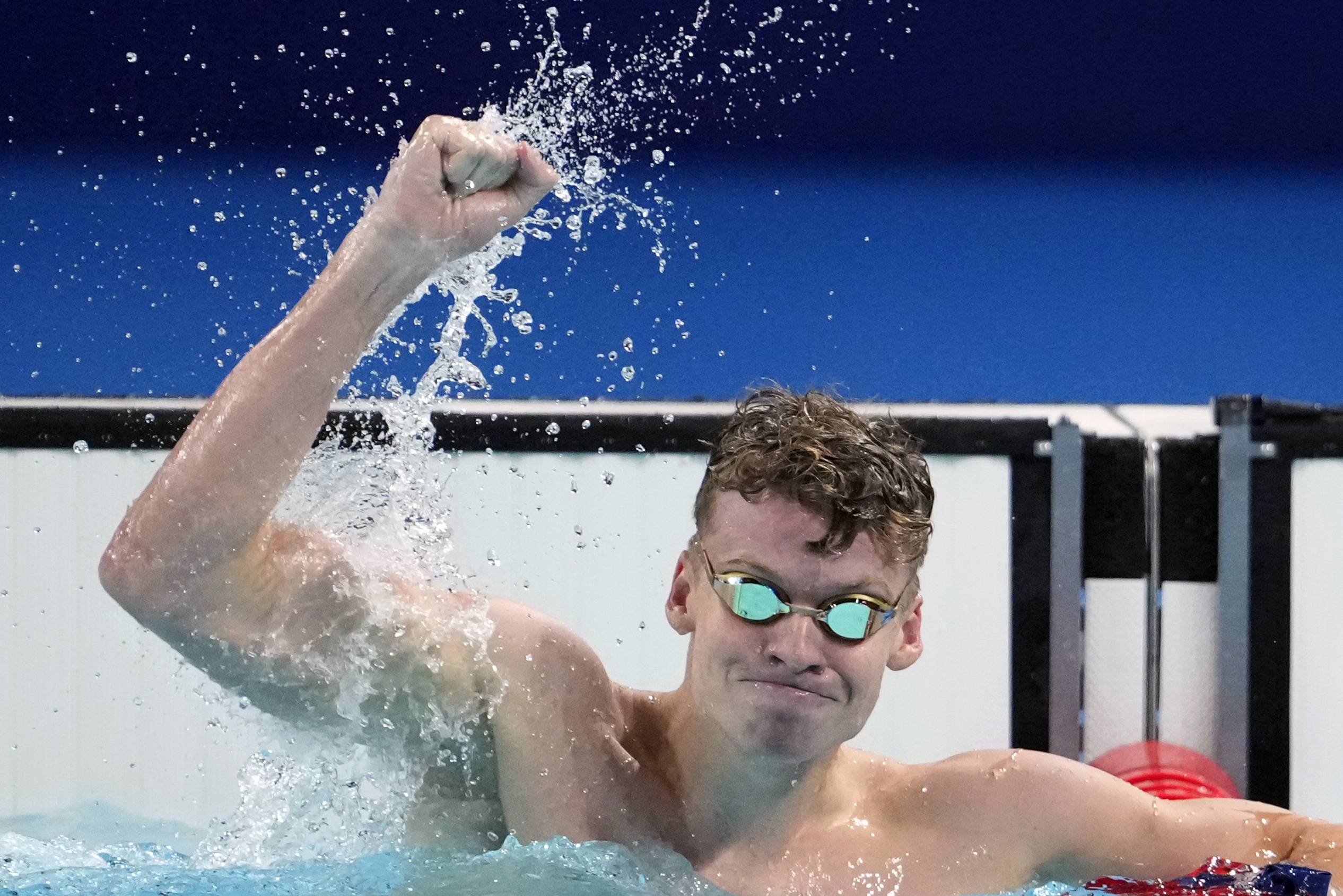 Leon Marchand, of France, celebrates after winning the men's 200-meter breaststroke final at the 2024 Summer Olympics, Wednesday, July 31, 2024, in Nanterre, France. (AP Photo/Matthias Schrader)