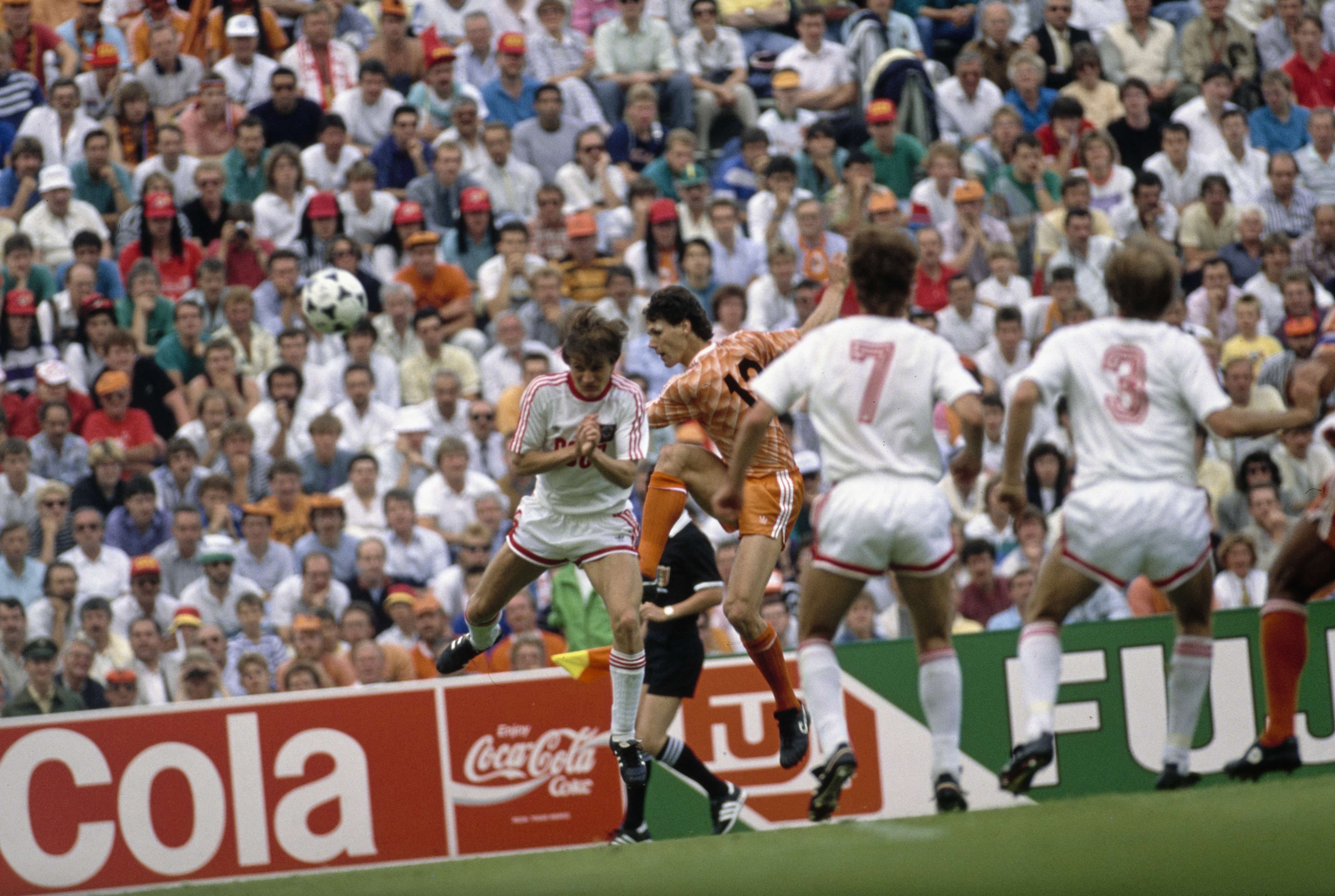 Russian footballer Vasyl Rats fails to block the shot from Dutch footballer Marco van Basten as he shoots to give the Netherlands a two-goal lead, as Russian footballers Sergei Aleinikov and Vagiz Khidiyatullin can only look on, during the UEFA Euro 1988 final between the Soviet Union and the Netherlands, held at Olympiastadion in Munich, Bavaria West Germany, 25th June 1988. The Netherlands won the match 2-0. (Photo by Bongarts/Getty Images)
