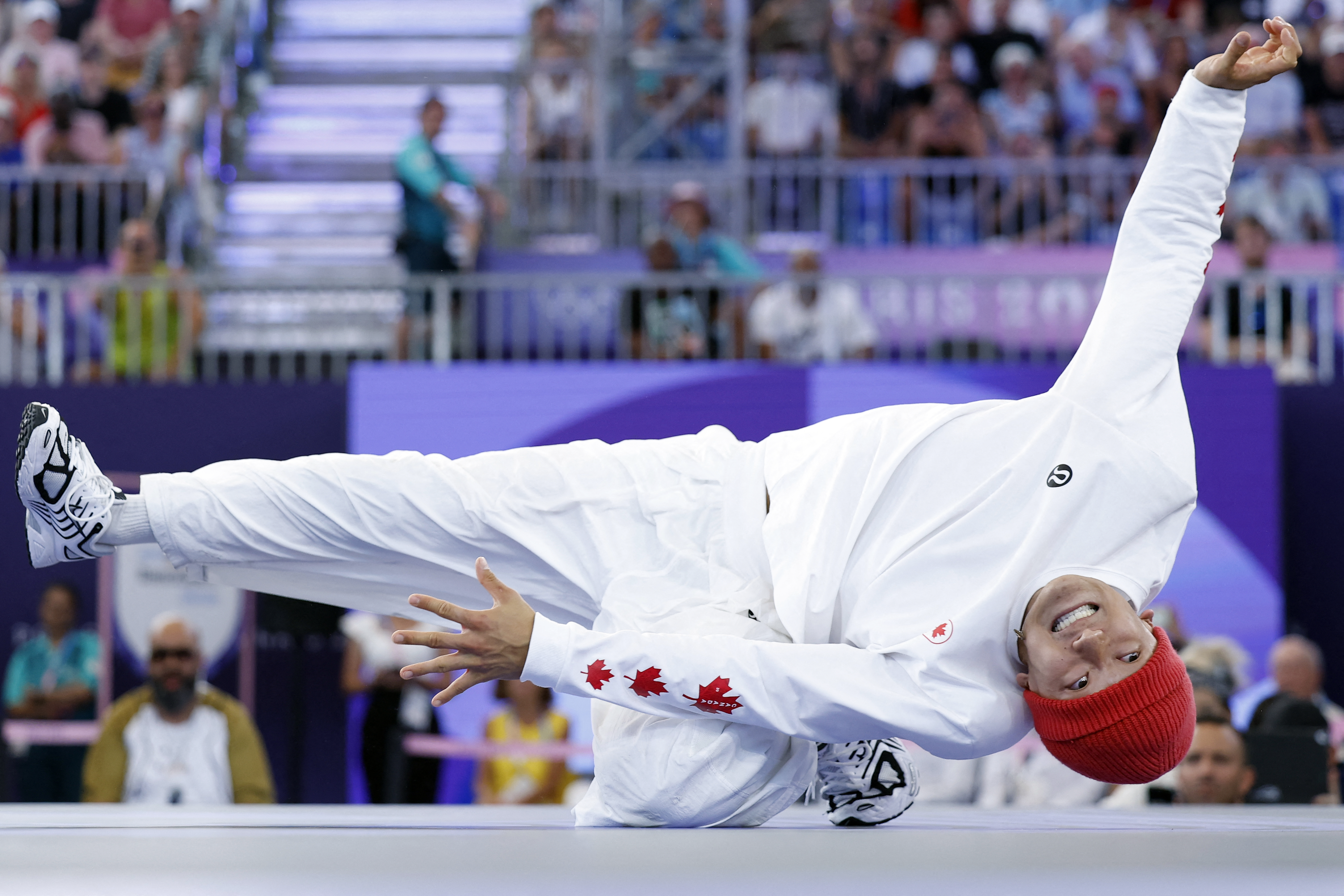 Canada's Philip Kim, known as Phil Wizard, competes in the men's breaking quarterfinal of the Paris 2024 Olympic Games at La Concorde, on August 10, 2024 [Odd Andersen/AFP]