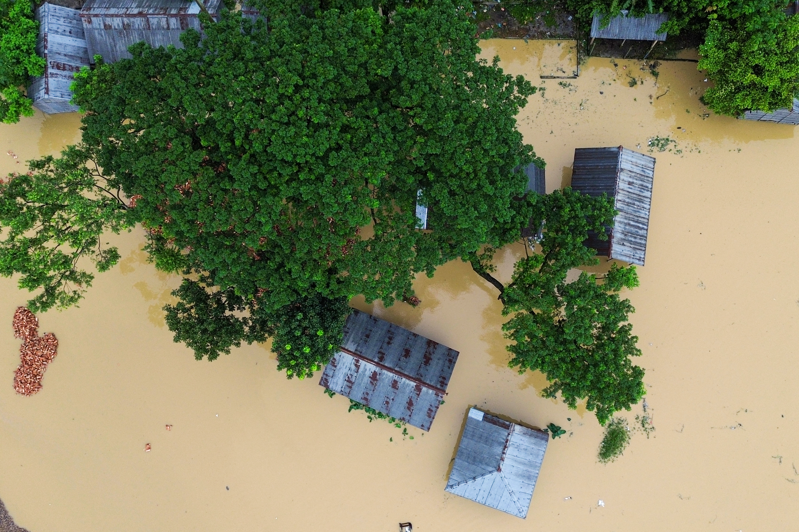 This aerial photograph shows deluged houses after floods in Comilla