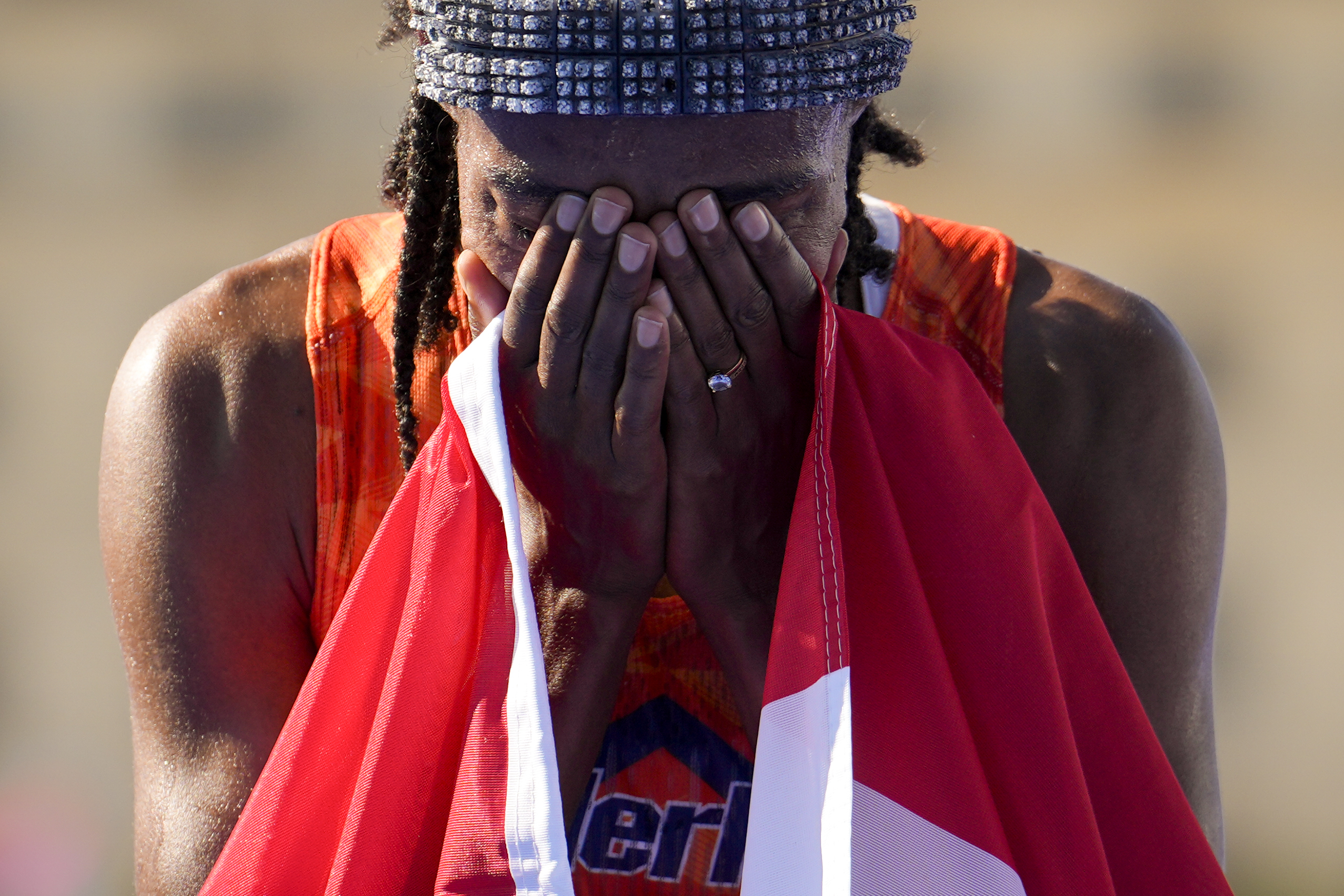 Sifan Hassan, of the Netherlands, reacts after crossing the finish line to win the gold medal at the end of the women's marathon competition at the 2024 Summer Olympics, Sunday, Aug. 11, 2024, in Paris, France. (AP Photo/Vadim Ghirda)
