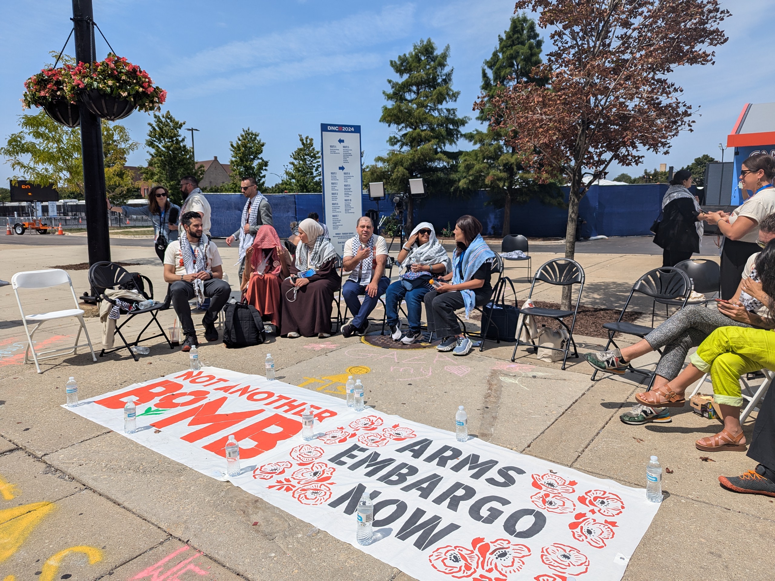 Uncommitted delegates stage a sit-in outside the Democratic National Convention in Chicago, August 22, 2024