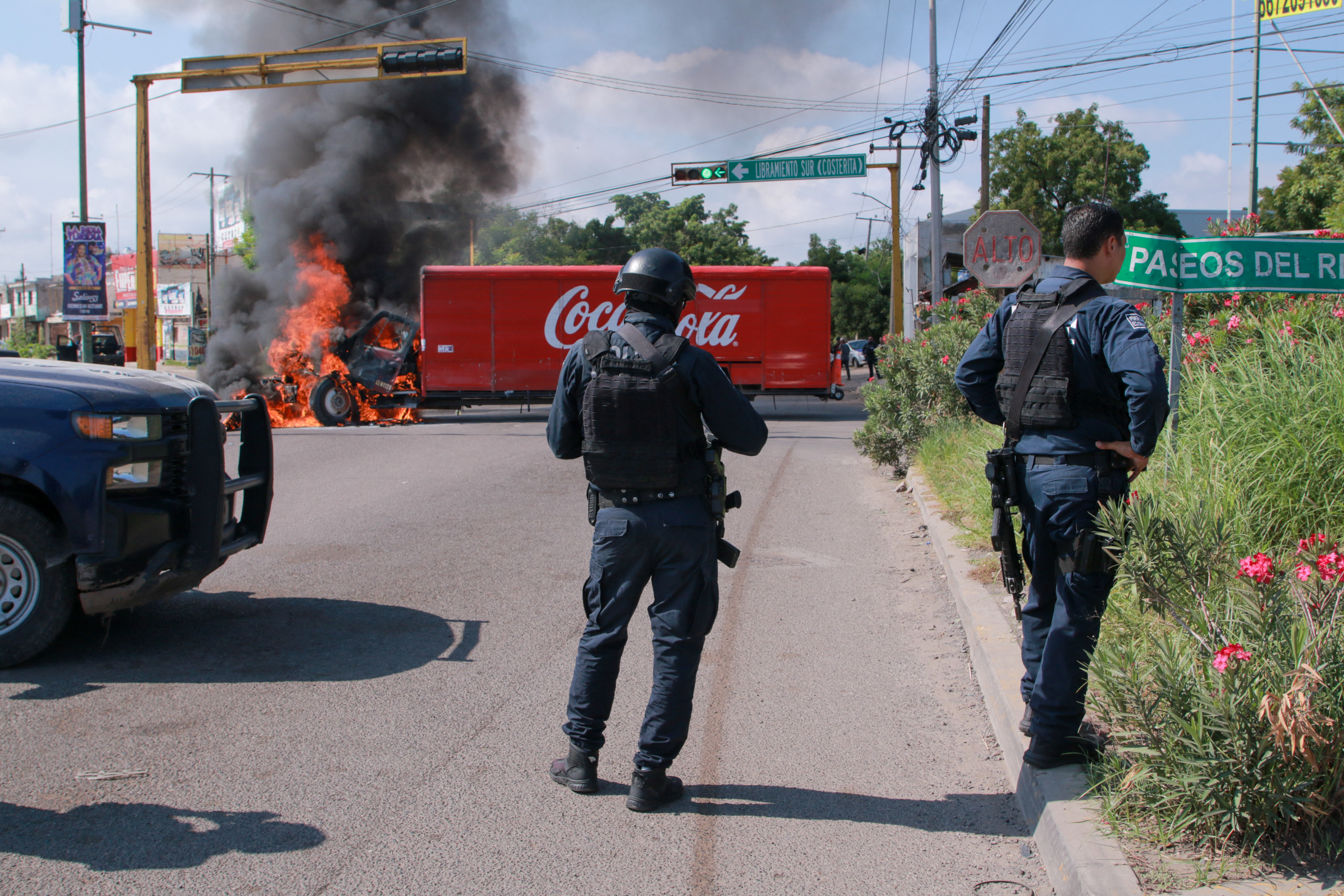A truck on fire is seen on the streets of Culiacan, Sinaloa State, Mexico, on September 11, 2024