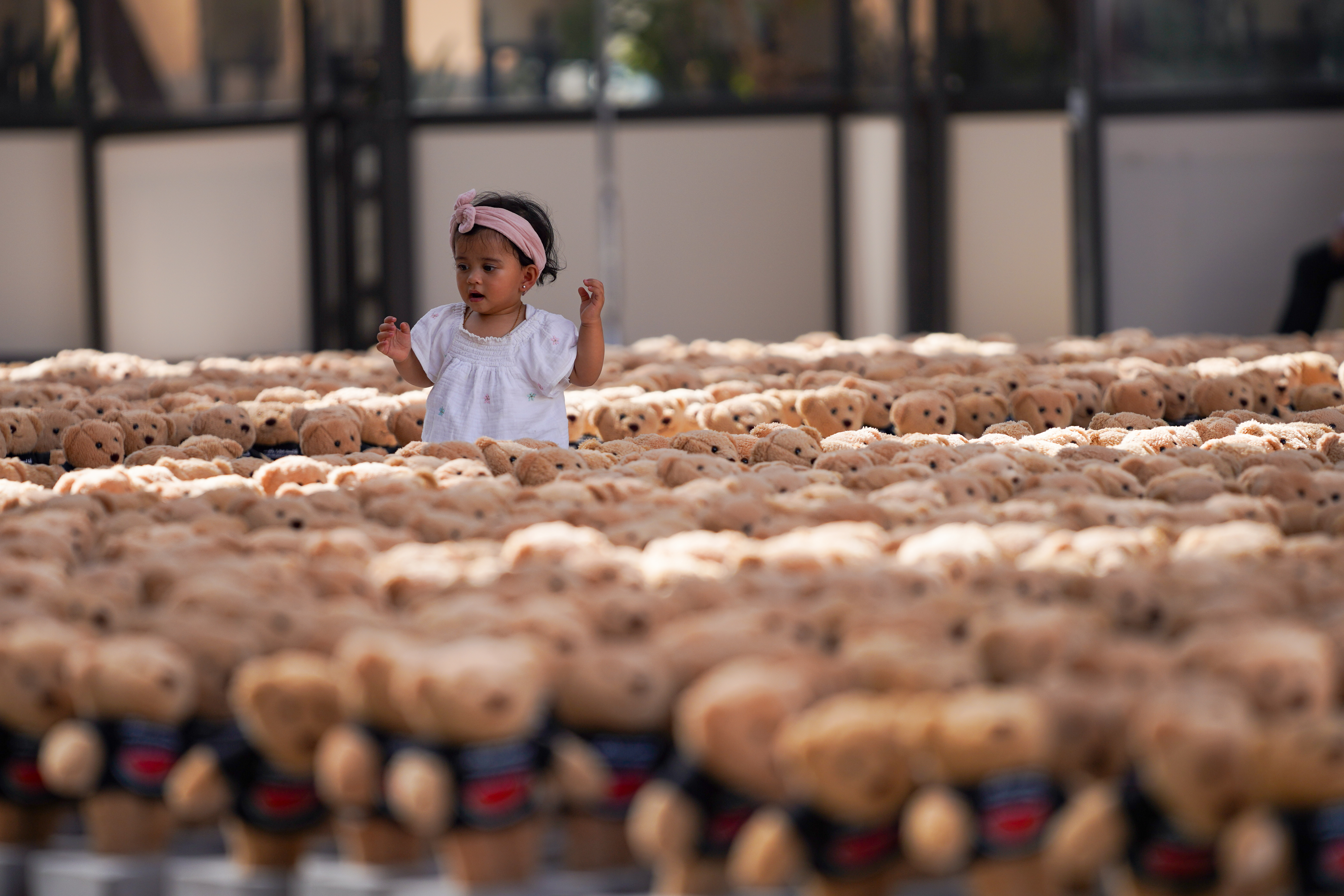 Charitable art installation titled "Echo of Lost Innocence", designed by multidisciplinary artist Bachir Mohammad. The art installation contains over 15,000 small teddy bear sculptures, each symbolising a child's life lost during Israel’s war on Gaza. 21 Sep 2024, Doha, Qatar [Sorin Furcoi/Al Jazeera]