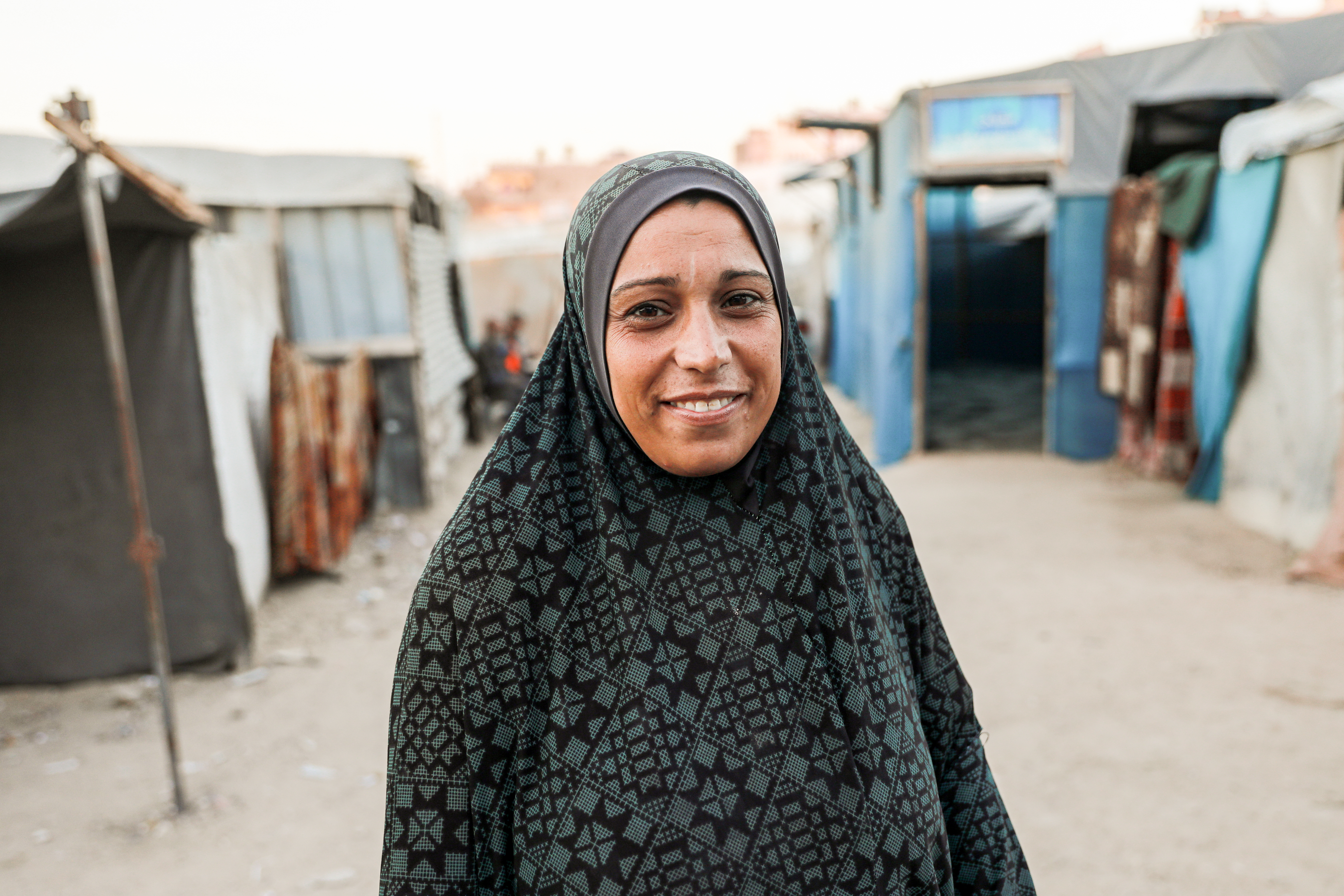 Nada Al Samouni spoke to Al Jazeera from a displacement camp in in Deir al-Balah as Israel's war on the people of Gaza continued [Abdelhakim Abu Riash/Al Jazeera]