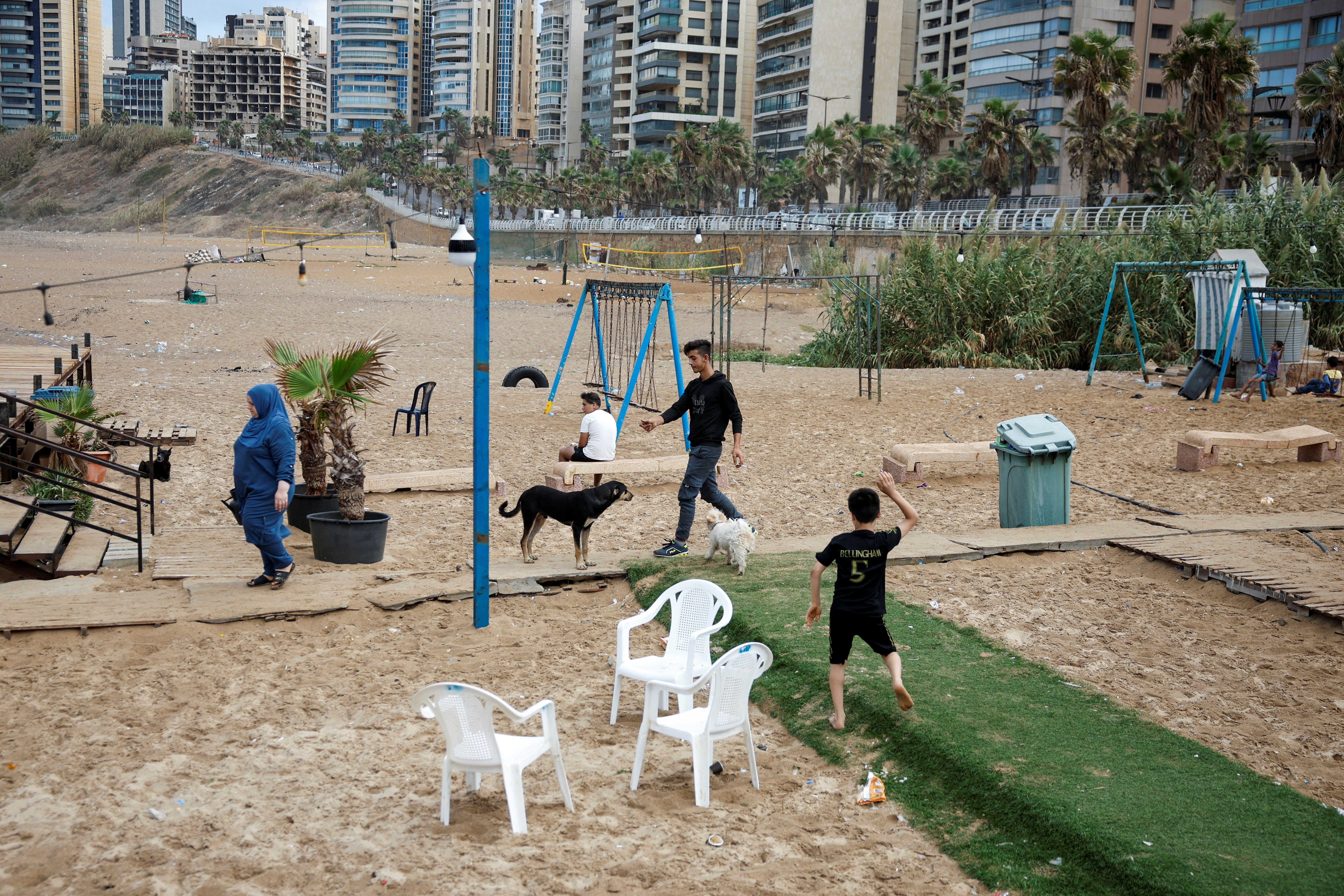 A view shows displaced children at a makeshift encampment where scores of displaced people live, amid cross-border hostilities between Hezbollah and Israeli forces, at a beach in Beirut, Lebanon, October 1