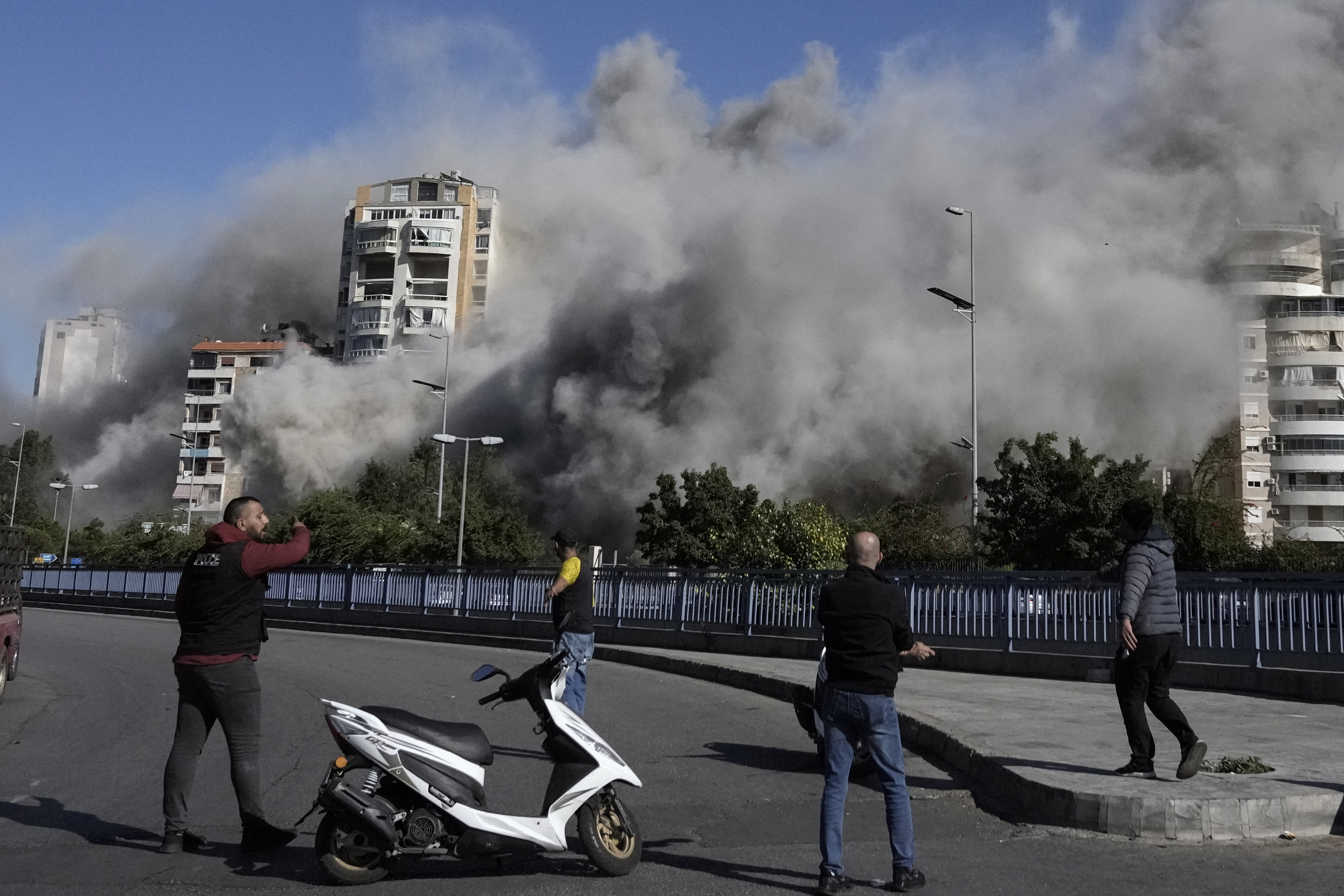 Images capture exact moments an Israeli missile strikes building in Beirut
