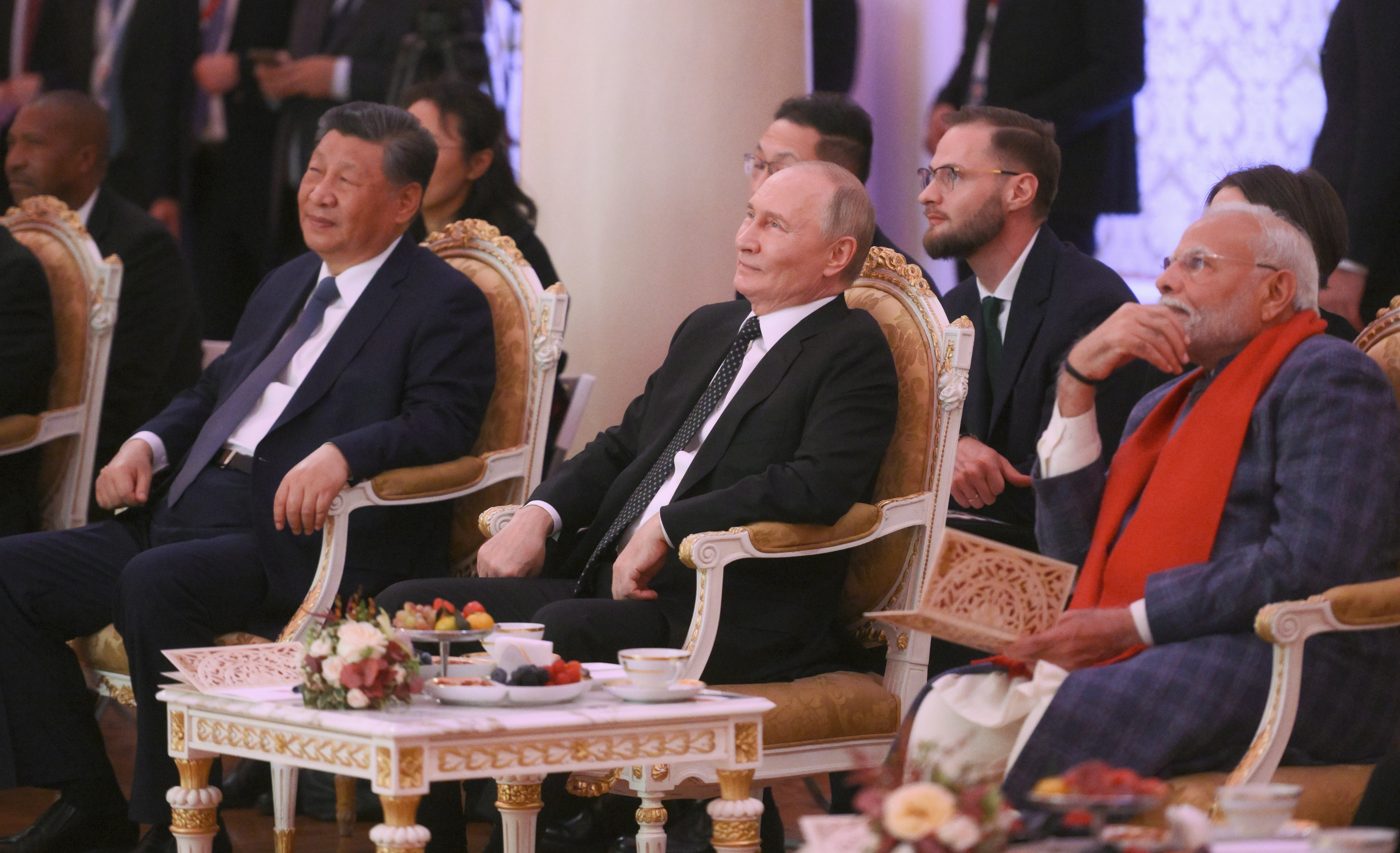 From left: Chinese President Xi Jinping, Russian President Vladimir Putin and Indian Prime Minister Narendra Modi attend an informal dinner for the heads of the delegations on the sidelines of the BRICS Summit at Kazan City Hall in Kazan, Russia, Oct. 22, 2024. (Alexander Kryazhev/Photo host brics-russia2024.ru via AP)