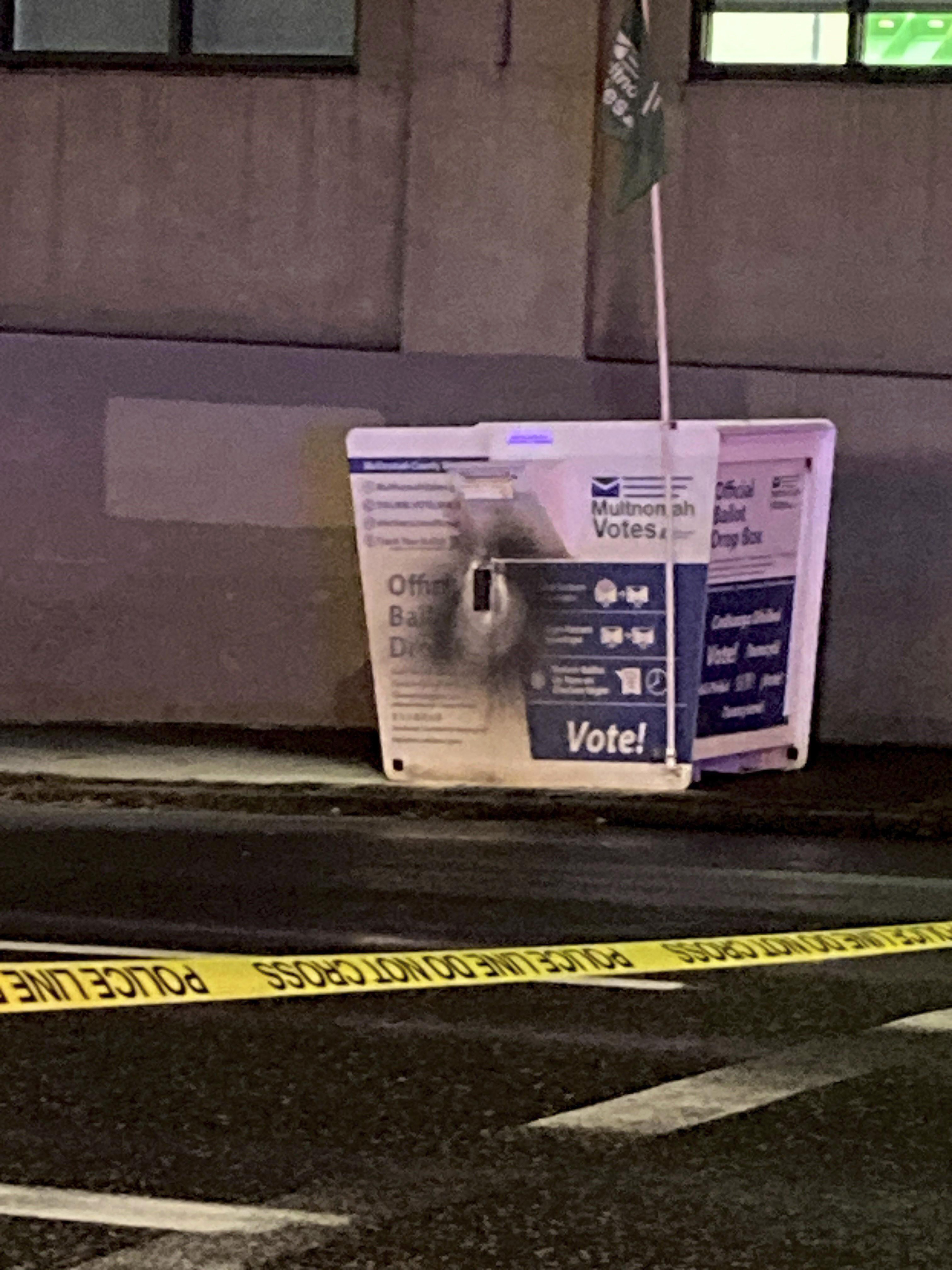 This image released by the Portland Police Bureau shows a ballot box after an incendiary device was discovered inside, in Portland, Ore., Monday, Oct. 28, 2024