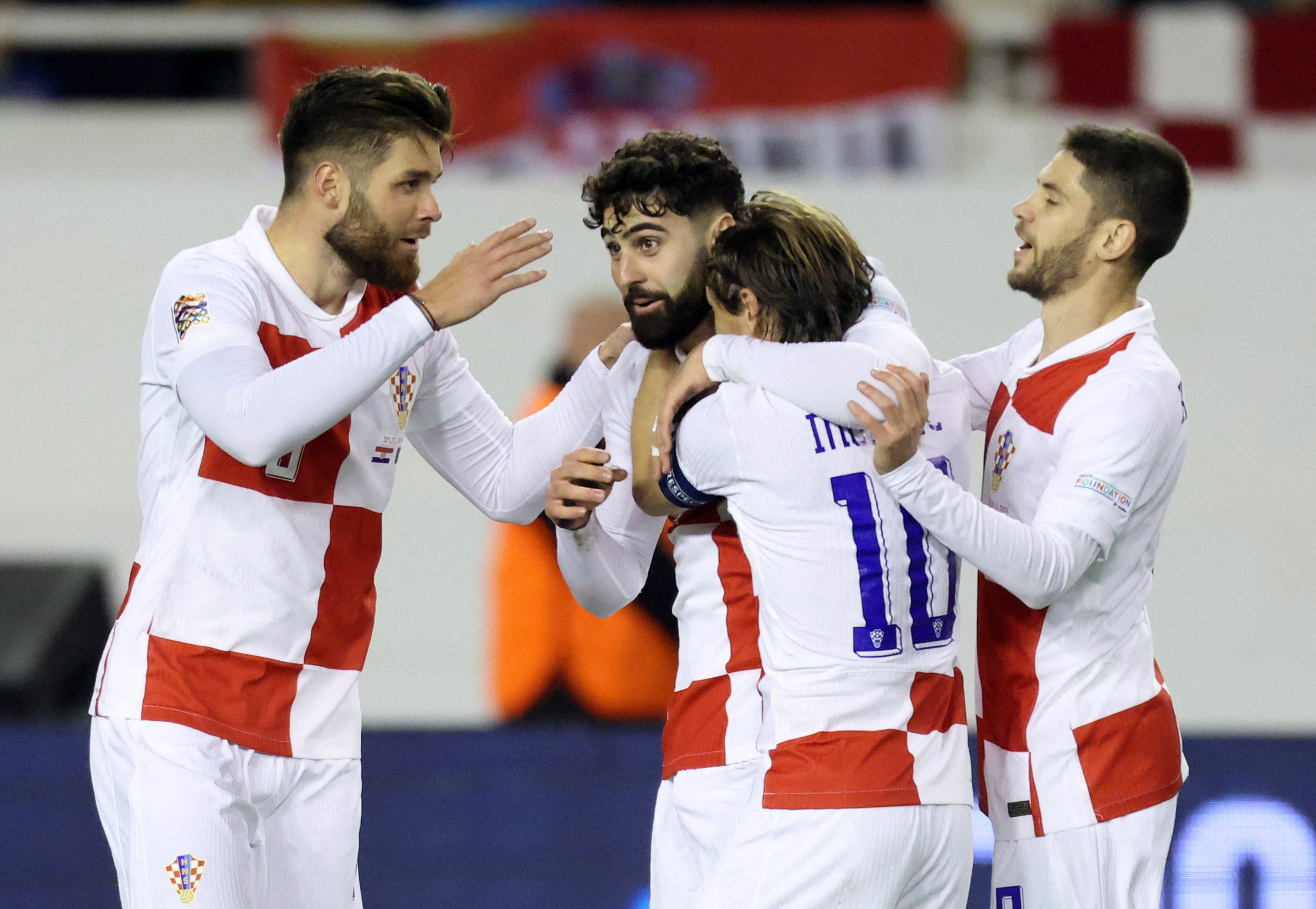 Croatia's Josko Gvardiol celebrates scoring their first goal with Duje Caleta-Car, Luka Modric and Andrej Kramaric