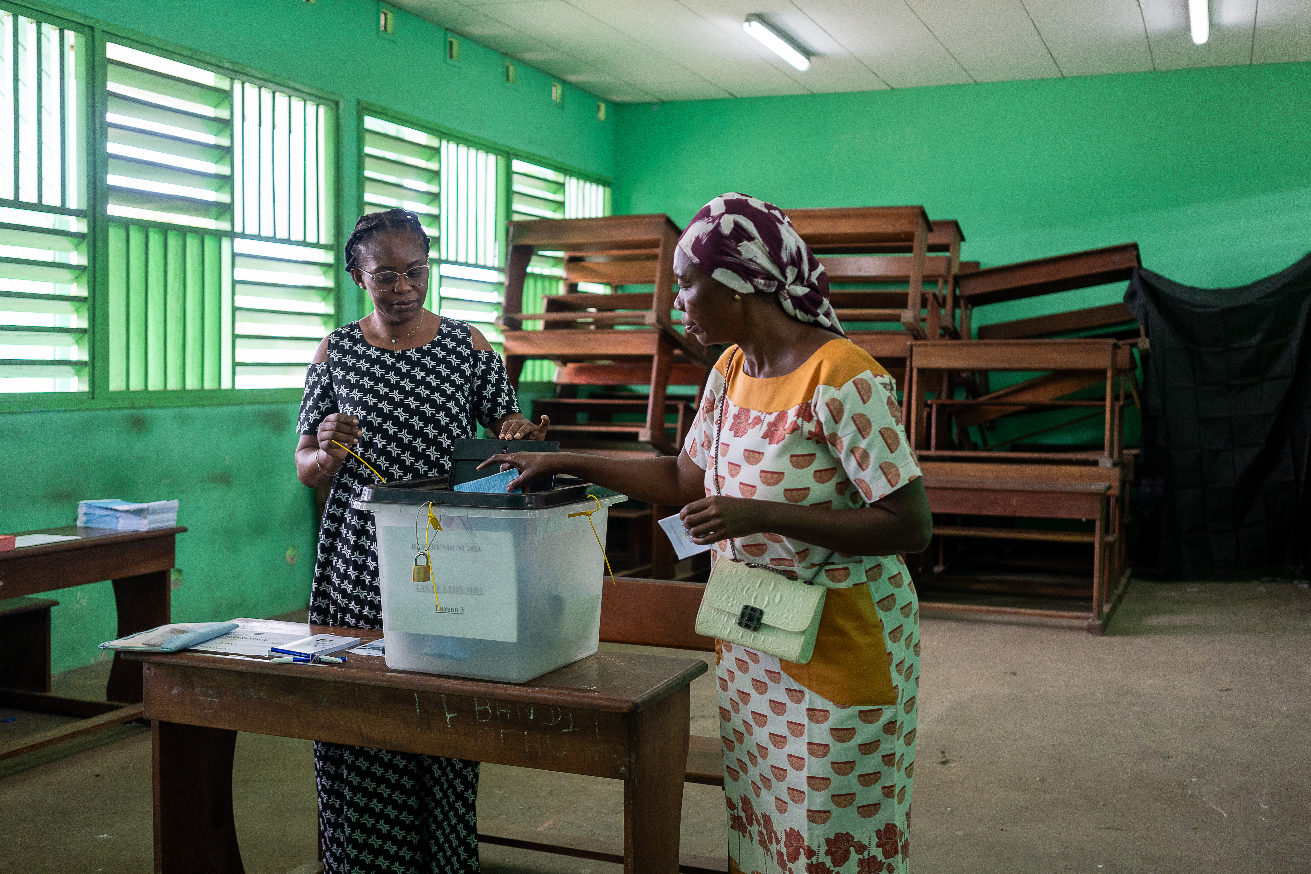 A voter casts her ballot at a polling station in Libreville, Gabon