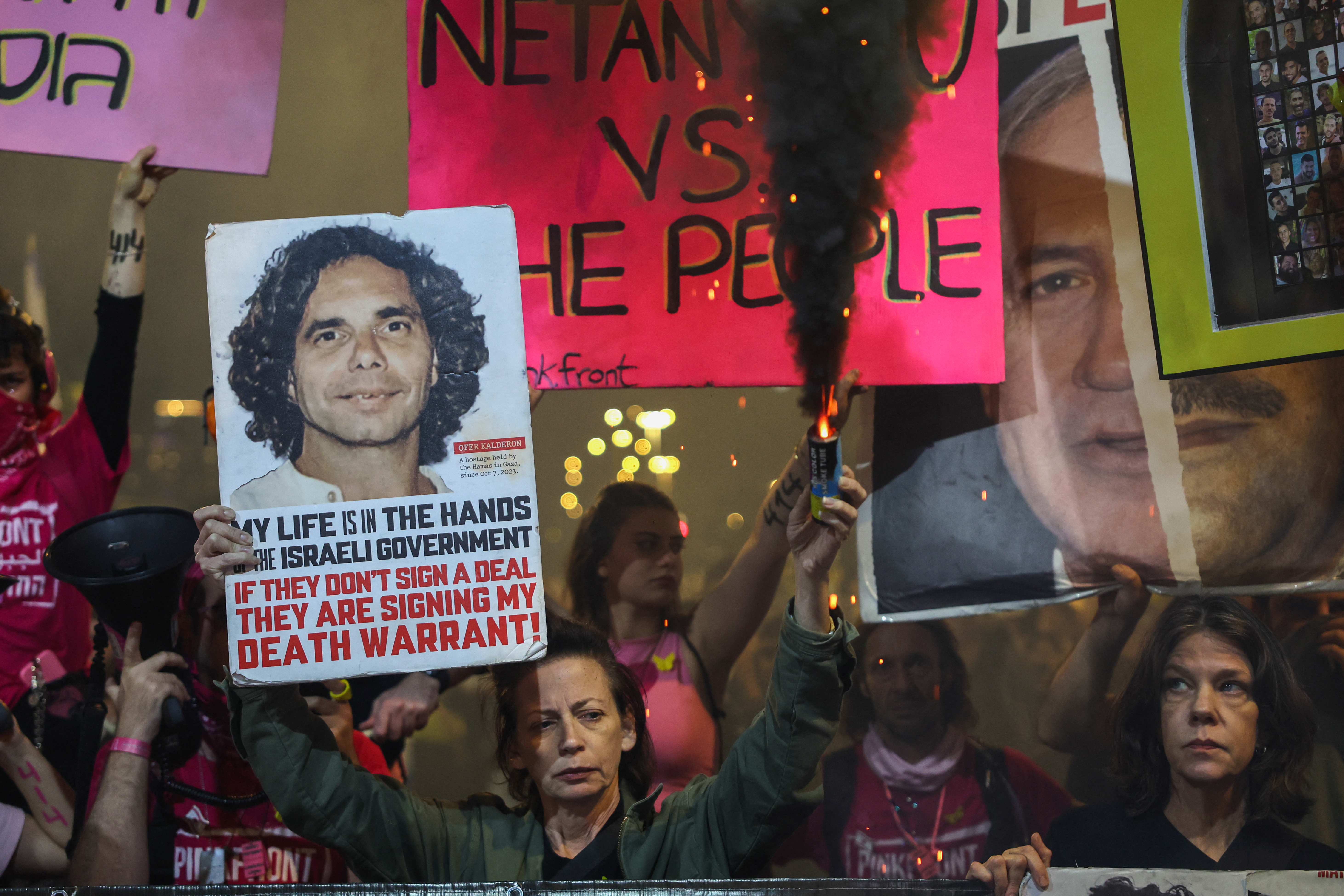 A demonstrator during an antigovernment protest in front of the Defence Ministry in Tel Aviv