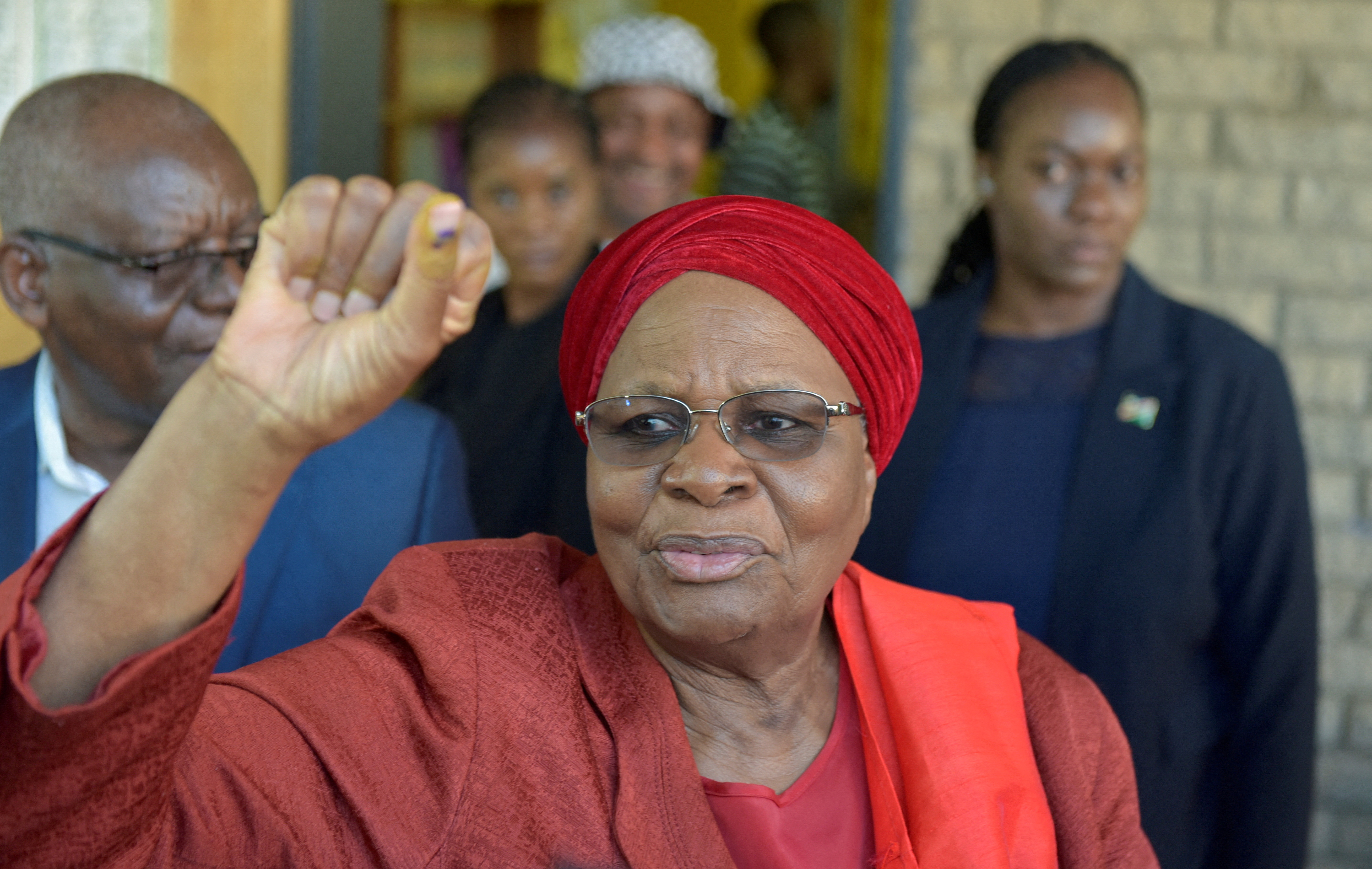 Namibia's Vice President and SWAPO presidential candidate Netumbo Nandi-Ndaitwah gestures after casting her vote in the elections in Windhoek, Namibia
