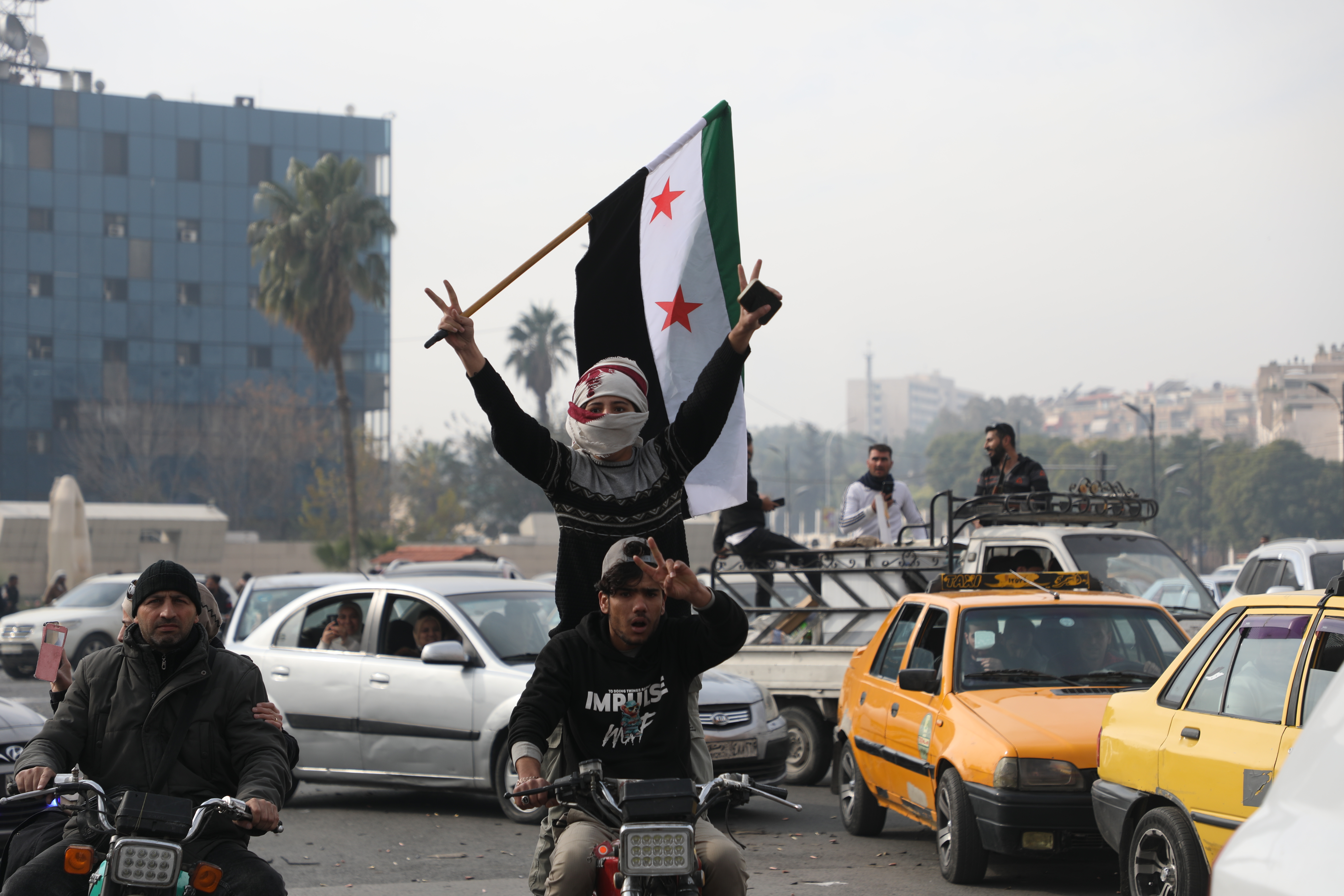 Opposition takes Damascus, says al-Assad overthrown