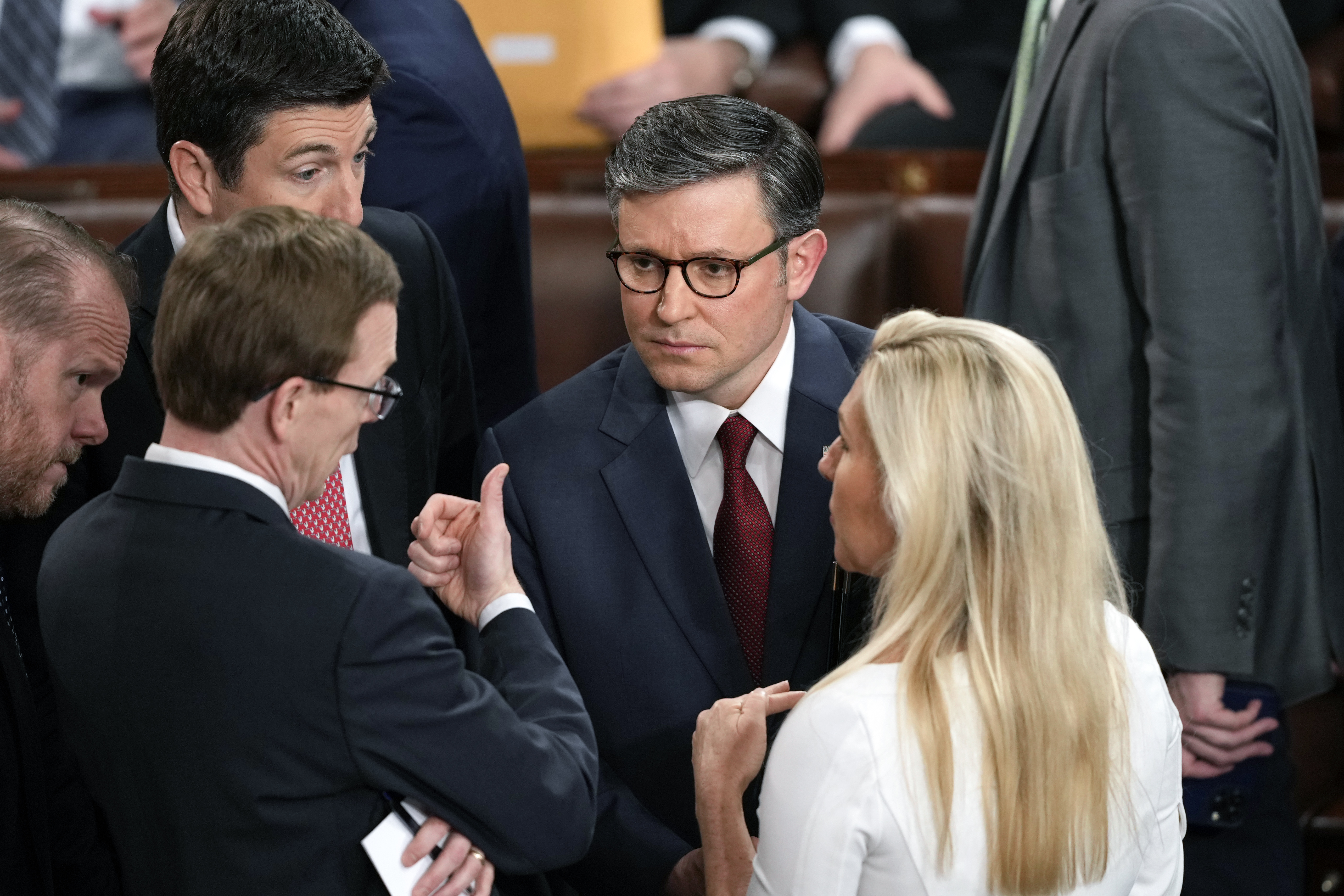 Mike Johnson speaks to colleagues in the House of Representatives