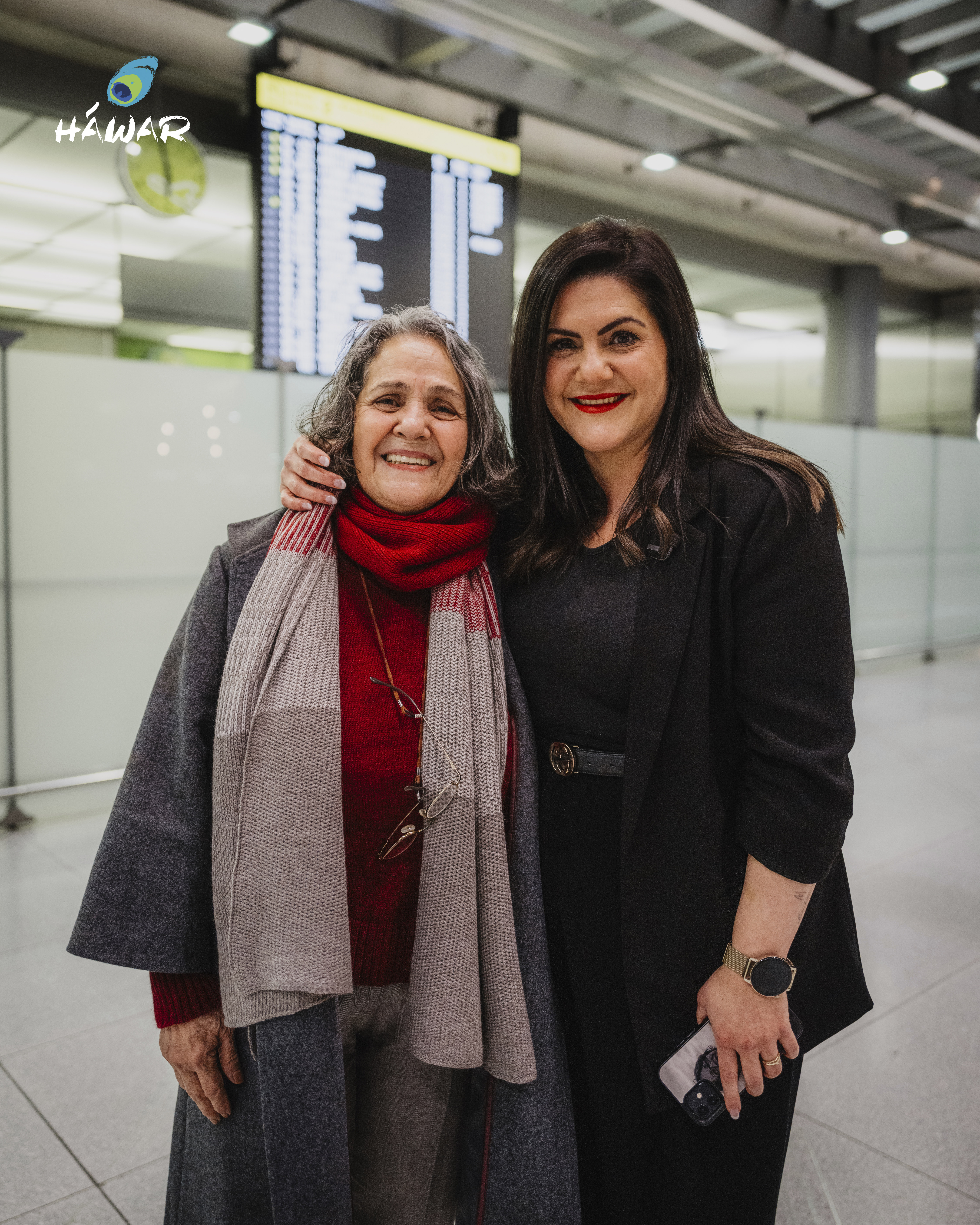 This handout photo provided by the human rights organisation HAWAR.help, shows German-Iranian rights activist Nahid Taghavi, left, with her daughter Mariam Claren