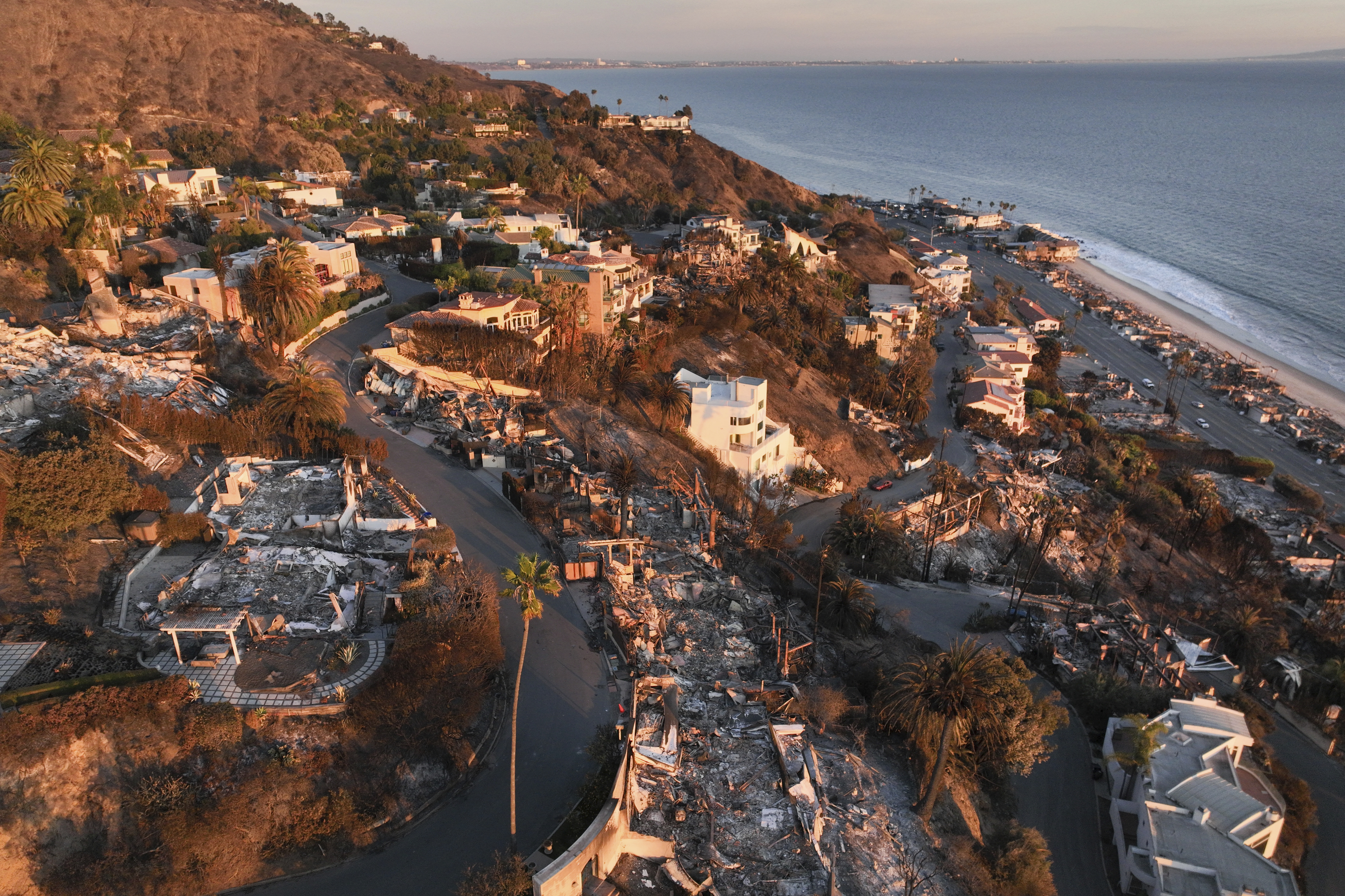 An aerial view shows the devastation by the Palisades Fire Thursday