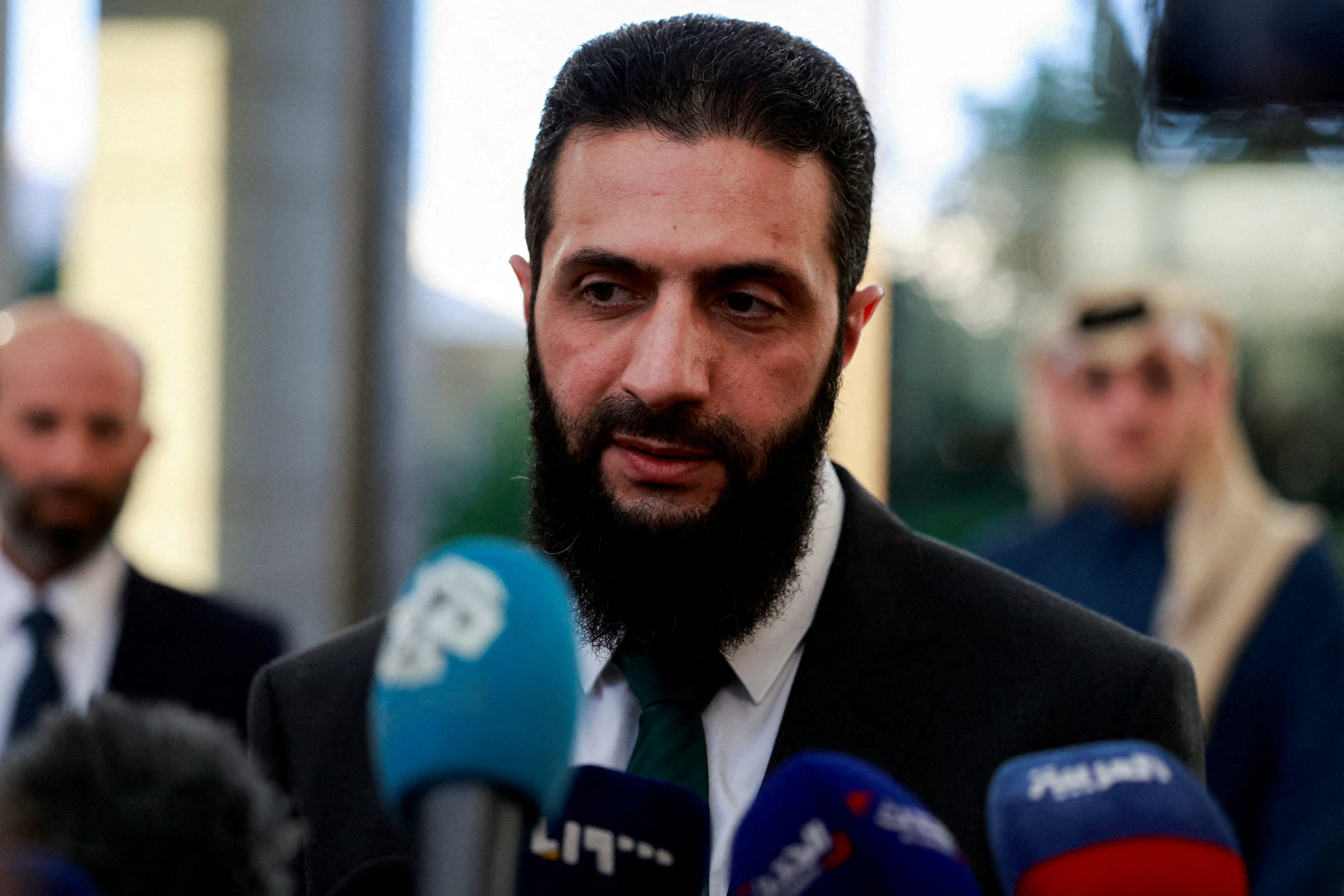 Syria's de facto leader Ahmed al-Sharaa, also known as Abu Mohammed al-Golani, speaks to the media