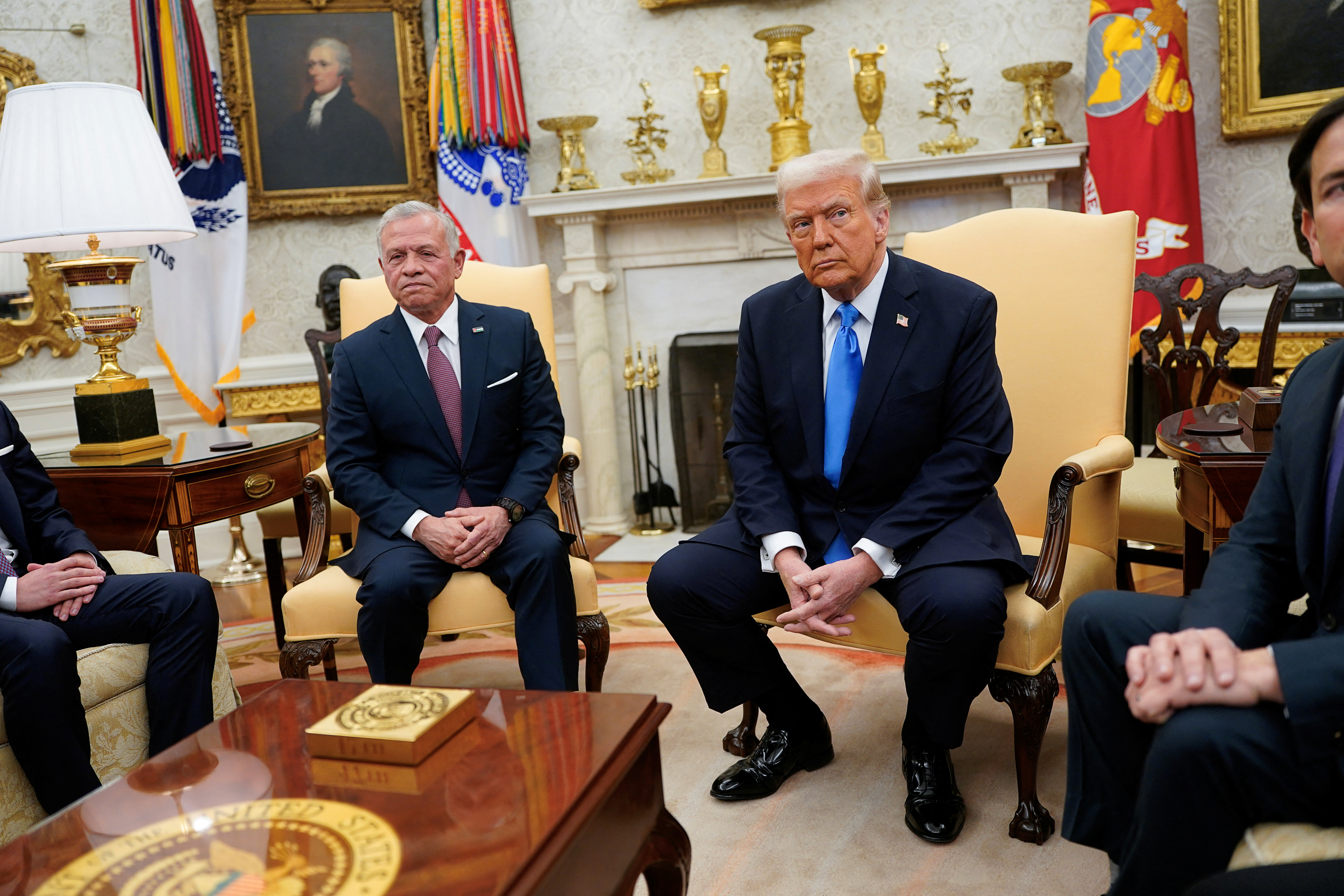 U.S. President Donald Trump meets with Jordan's King Abdullah in the Oval Office [File: Nathan Howard/Reuters]