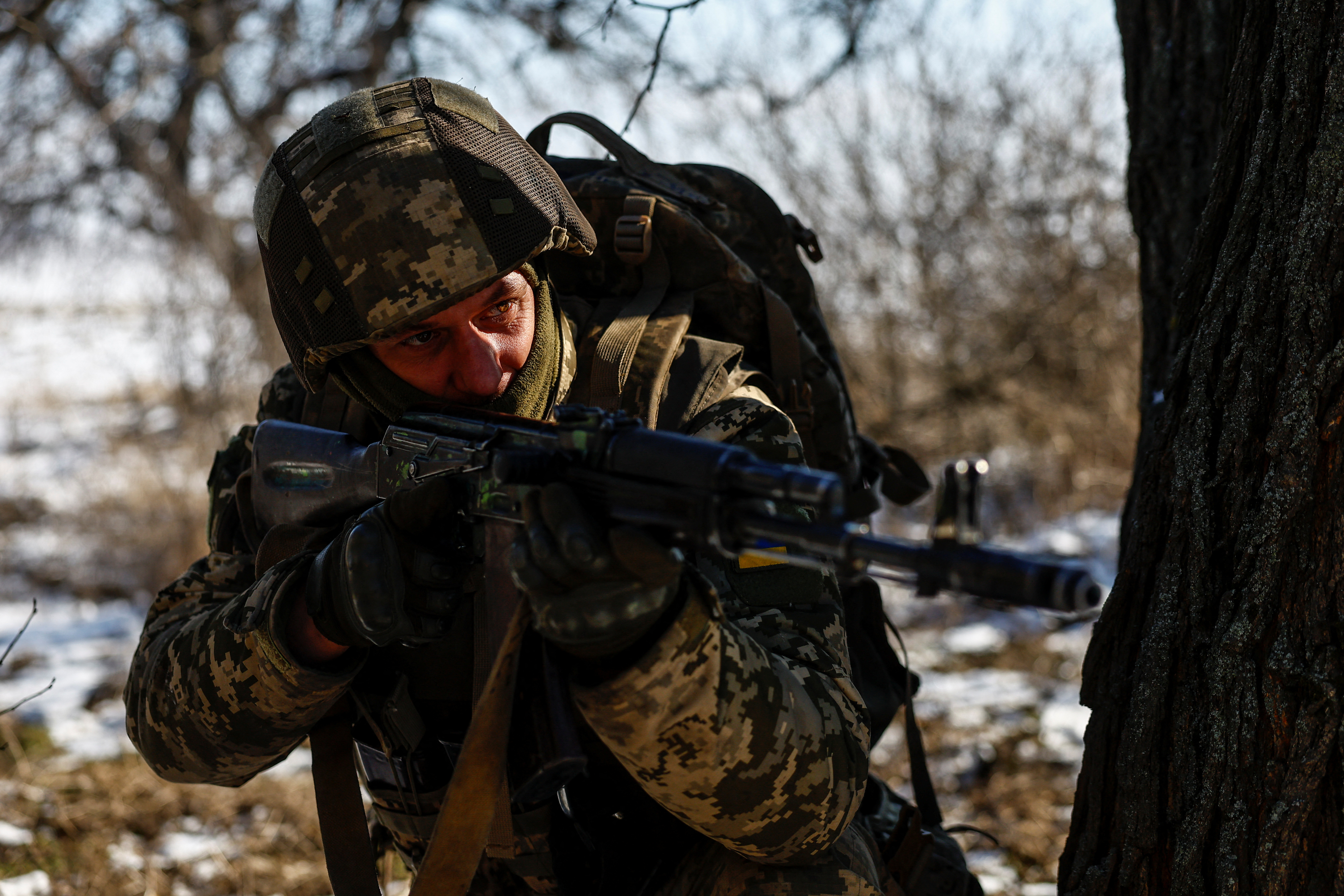 A Ukrainian serviceman of the 68th Jaeger Brigade attends military exercises at a training ground in Dnipropetrovsk region, Ukraine, on February 20, 2025 [Valentyn Ogirenko/Reuters]