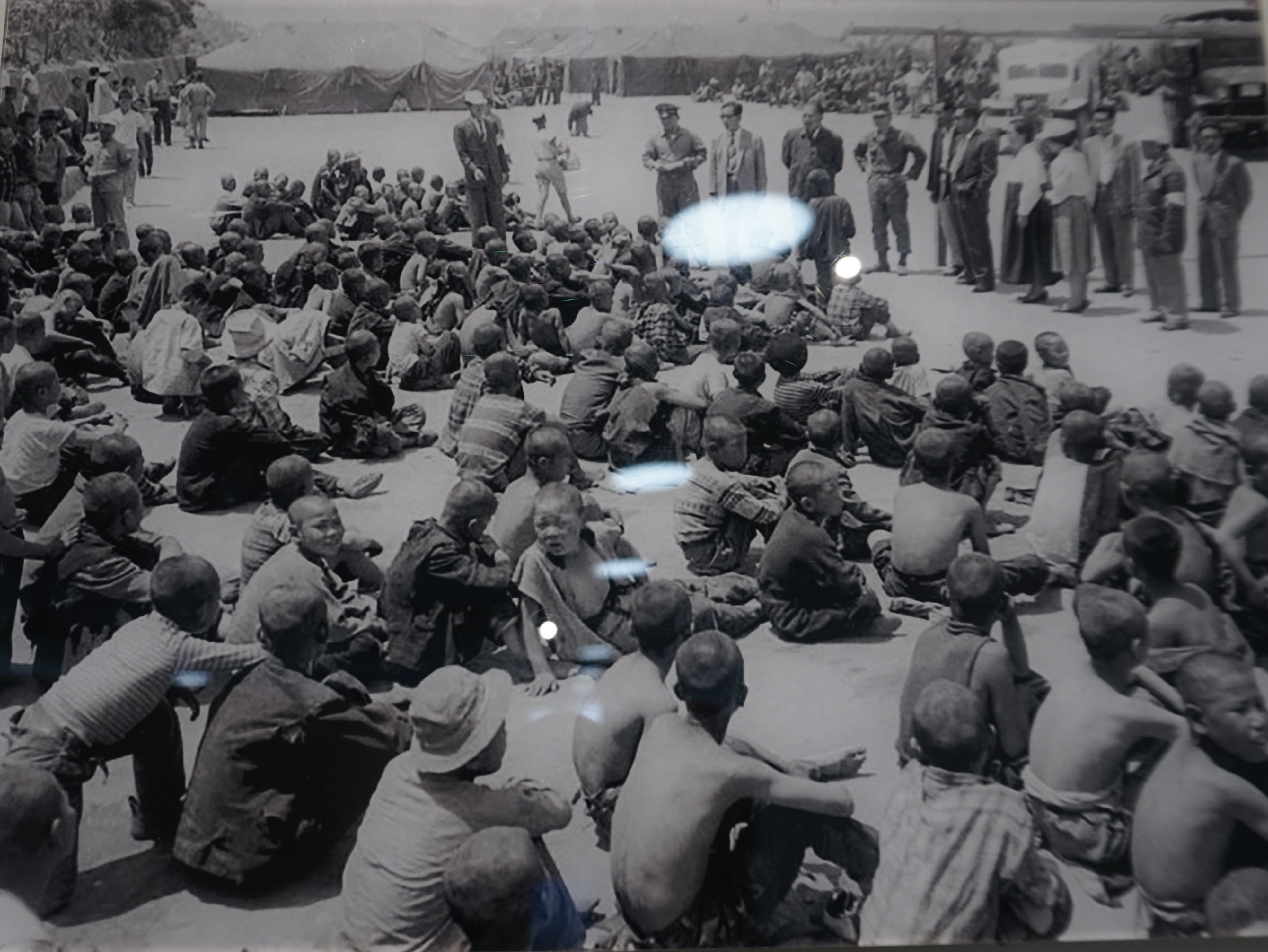 Inmates sitting in front of government officials at Seon-gam Academy-1740036846