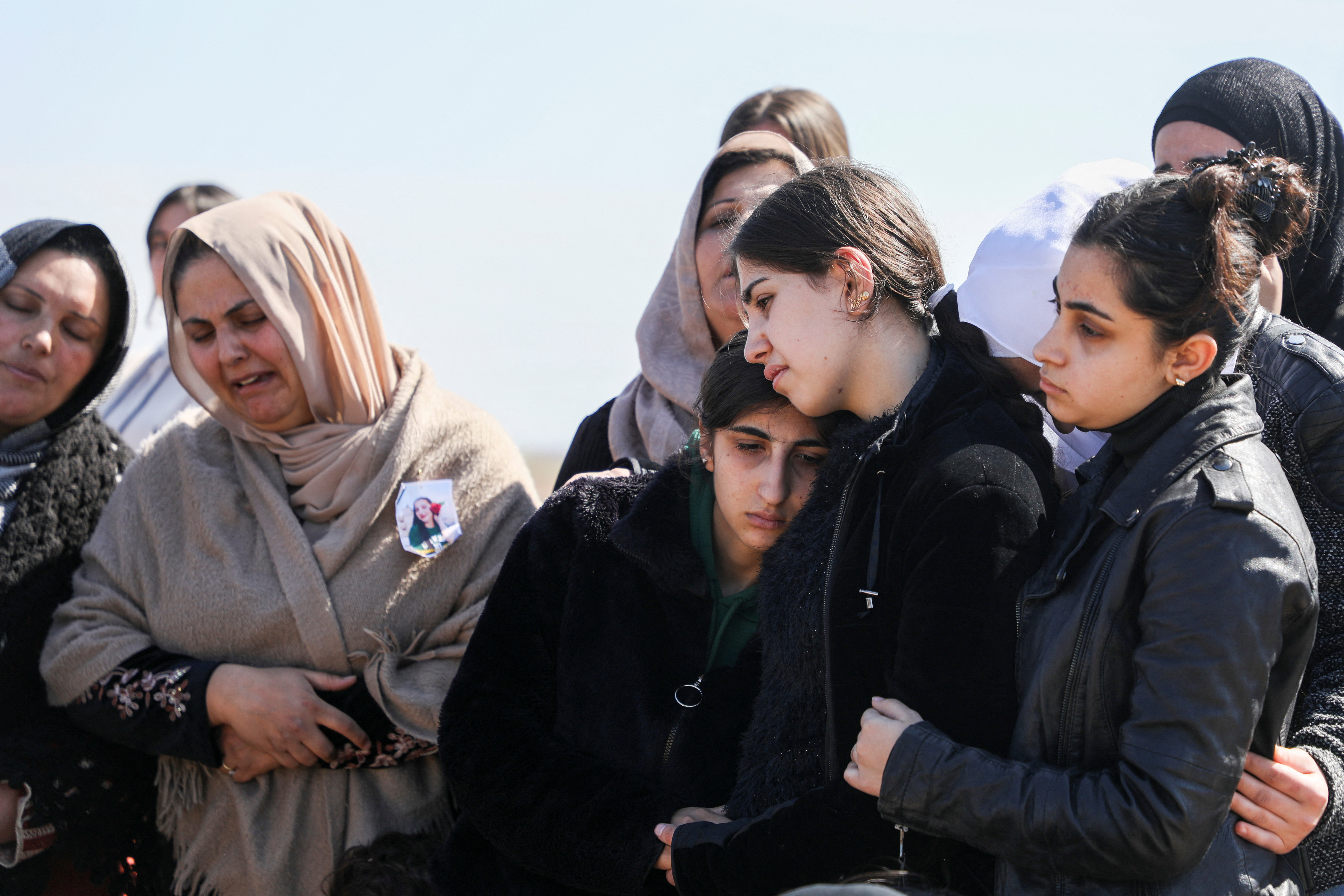 Mourners react during the funeral of Shinda Kisho who was killed in Latakia, after hundreds were killed in some of the deadliest violence in 13 years of civil war, pitting loyalists of deposed President Bashar al-Assad against the country's new Islamist rulers, in Qamishli, Syria