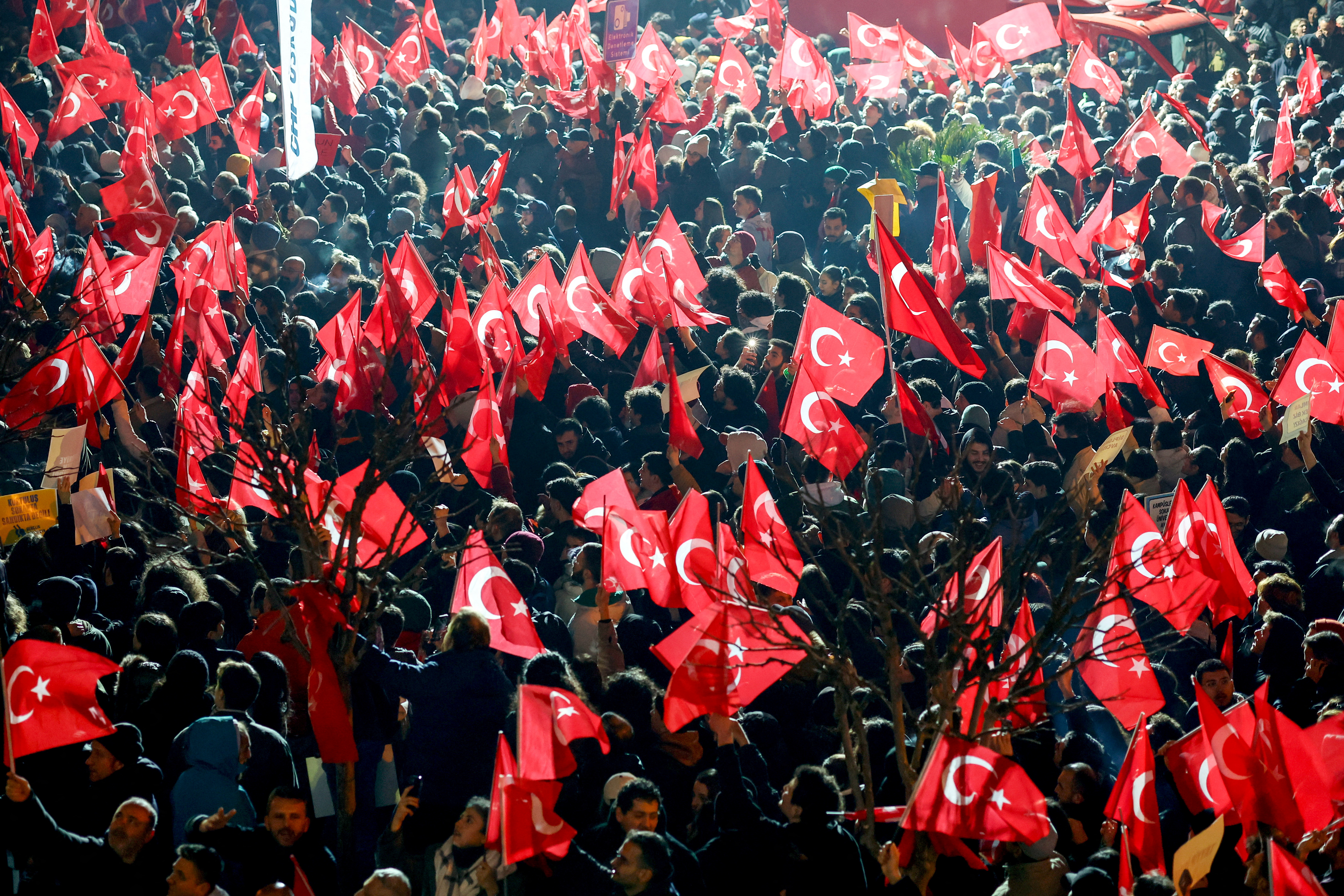 Supporters of Istanbul Mayor Ekrem Imamoglu gather outside the Istanbul Metropolitan Municipality building to protest, March 19, 2025. [Murad Sezer/Reuters]