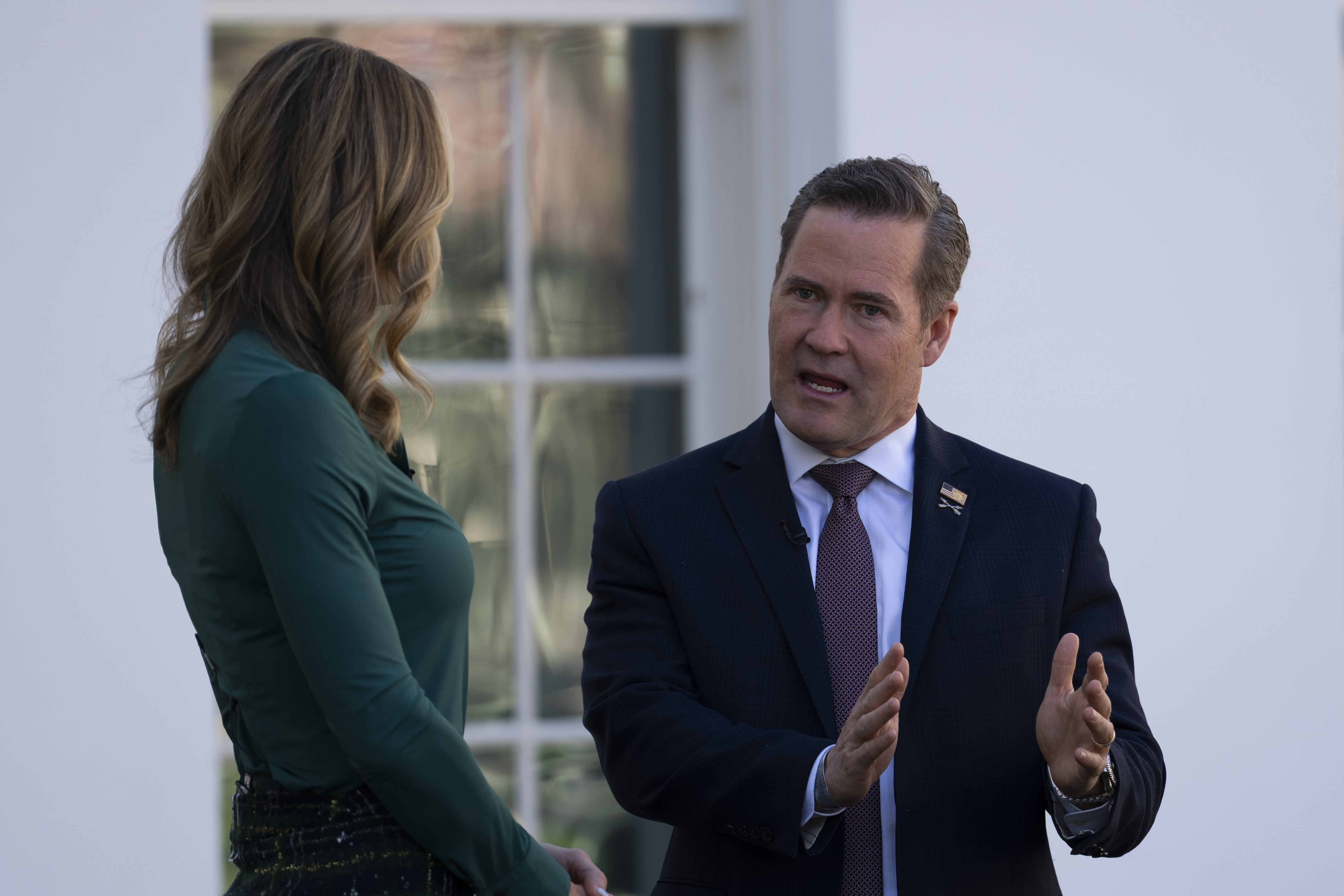 Mike Waltz speaks with Lara Trump outside the White House