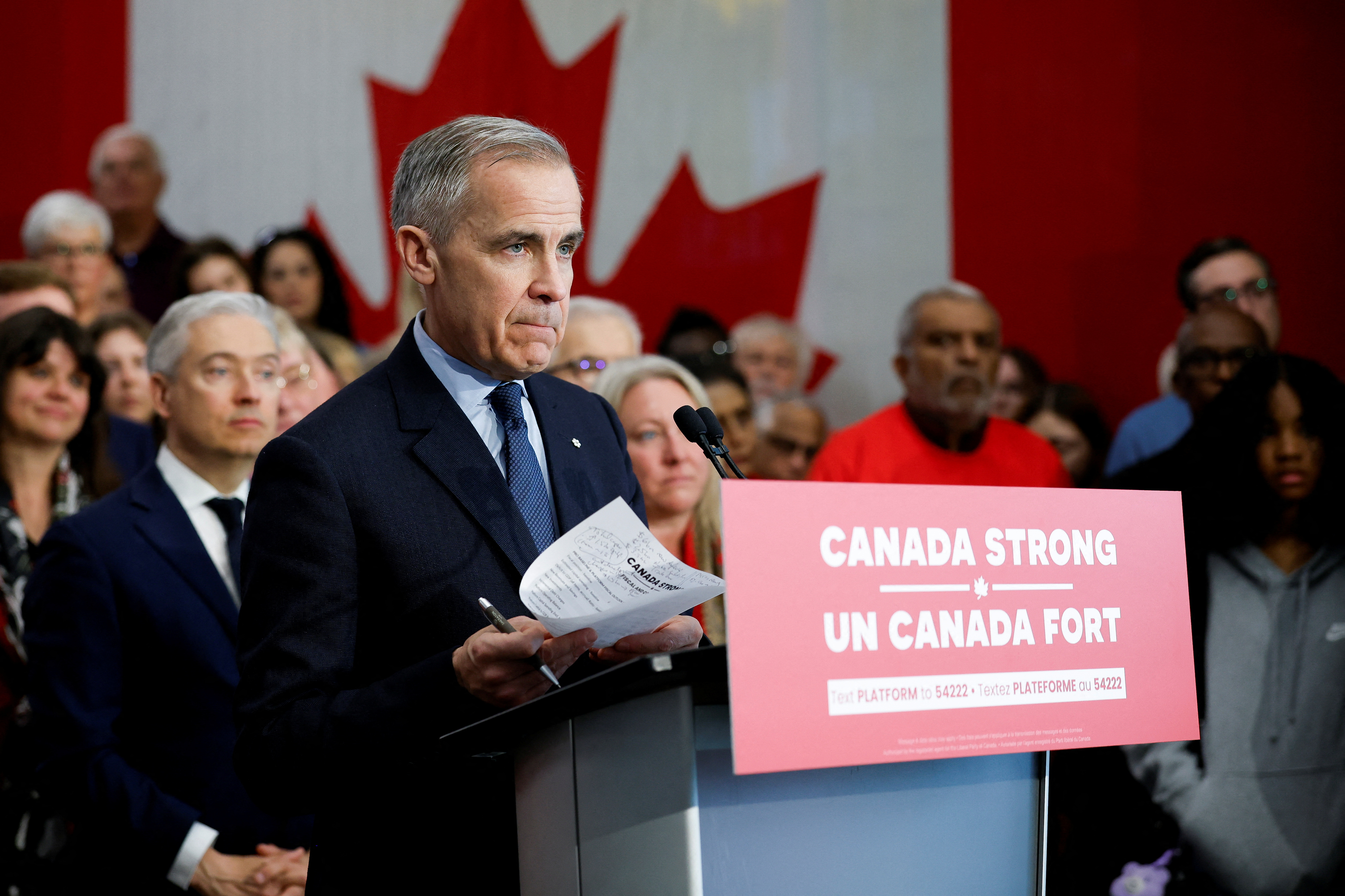 Canada's Prime Minister Mark Carney looks on as he announces the release of his party's platform during his Liberal Party election campaign tour, at Durham College in Whitby, Ontario, Canada April 19, 2025. REUTERS/Carlos Osorio