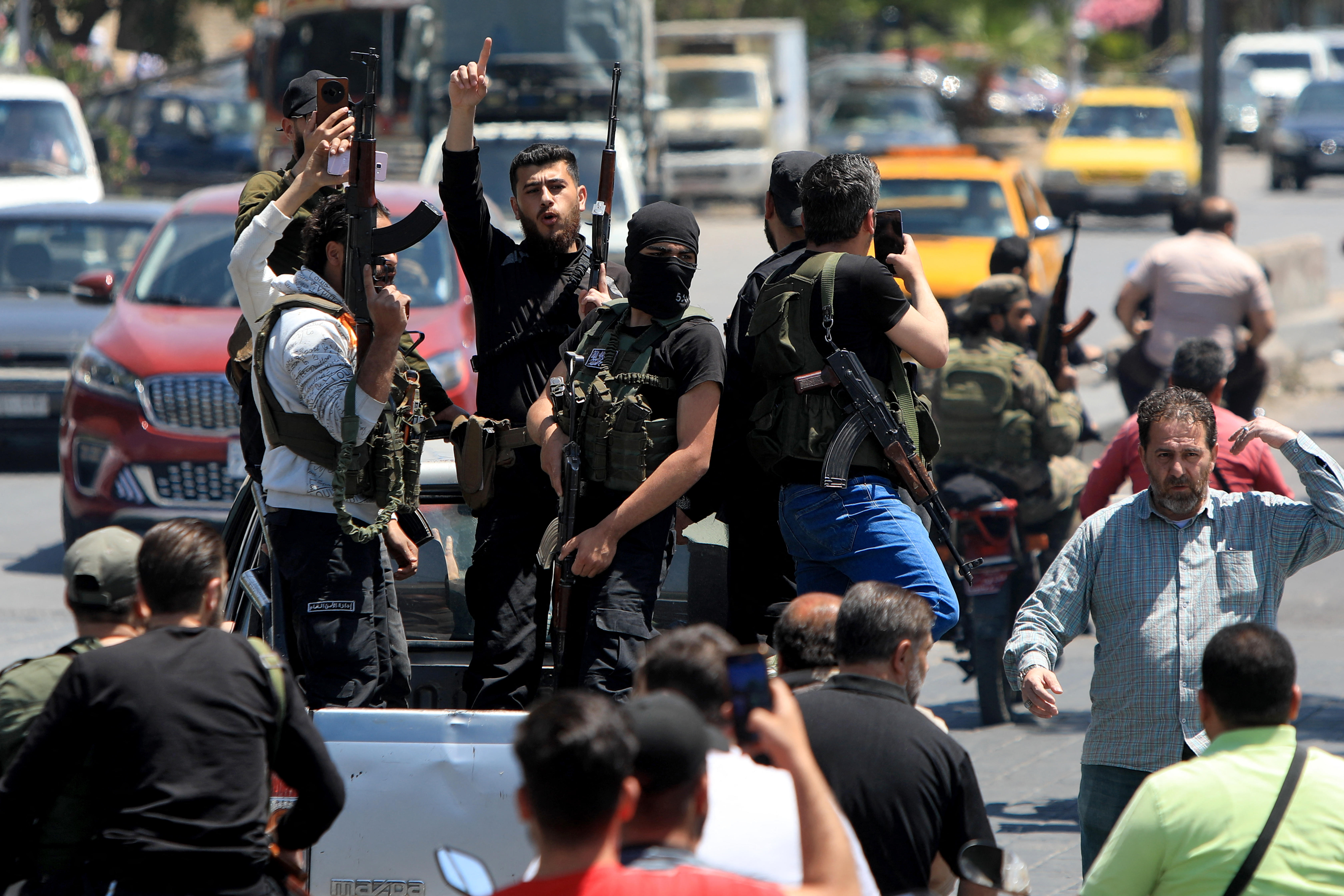 Syrian security personnel in Damascus after overnight sectarian clashes