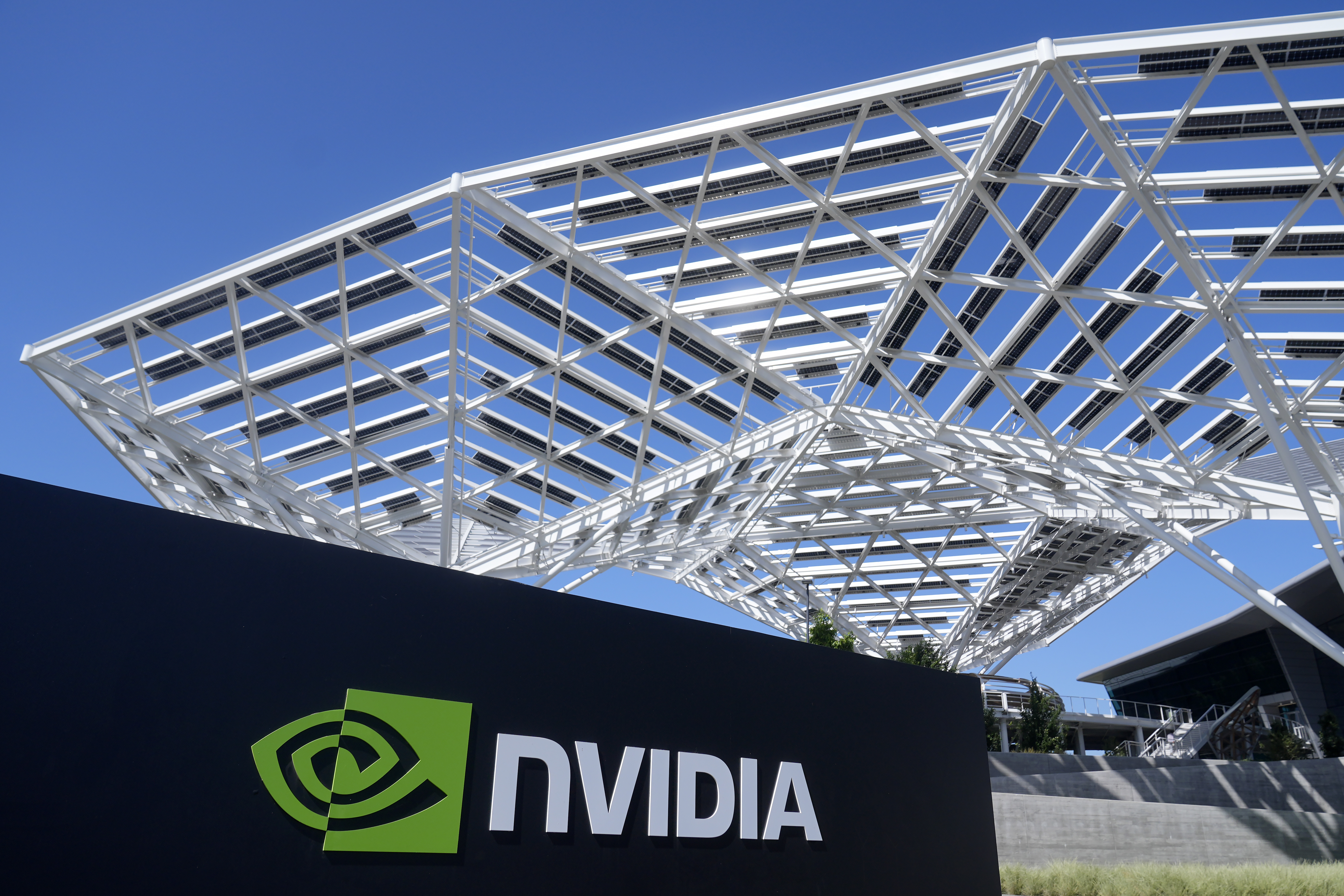 A sign to a Nvidia office building is shown in Santa Clara, Calif., Wednesday, Aug. 7, 2024. (AP Photo/Jeff Chiu)